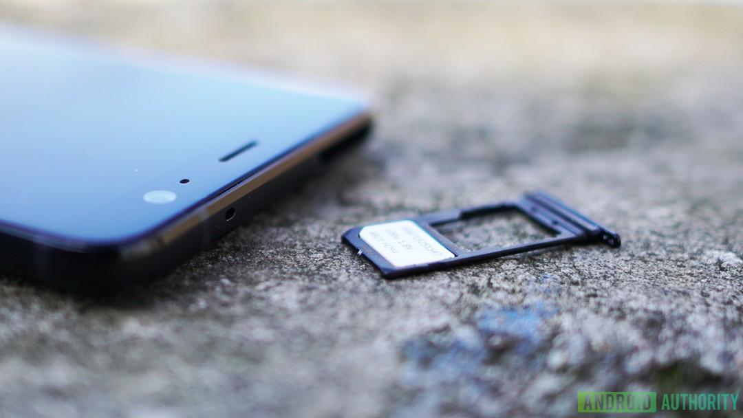 A SIM and microSD card tray.