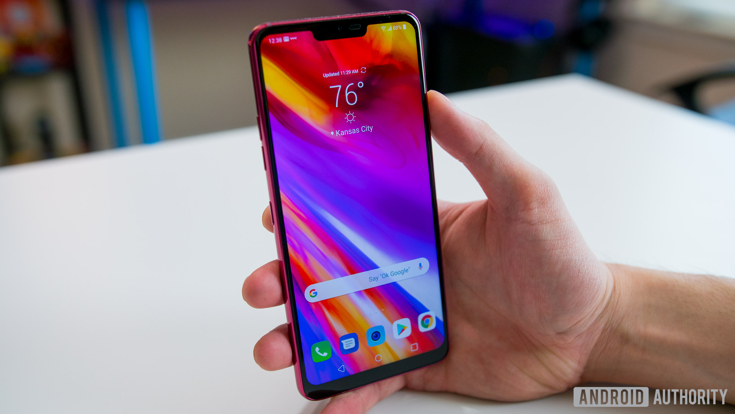 LG G7 ThinQ home screen held in hand