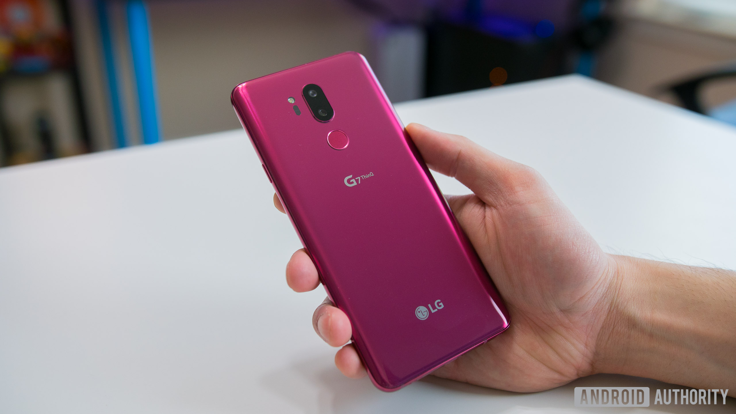 LG G7 ThinQ in hand showing the back
