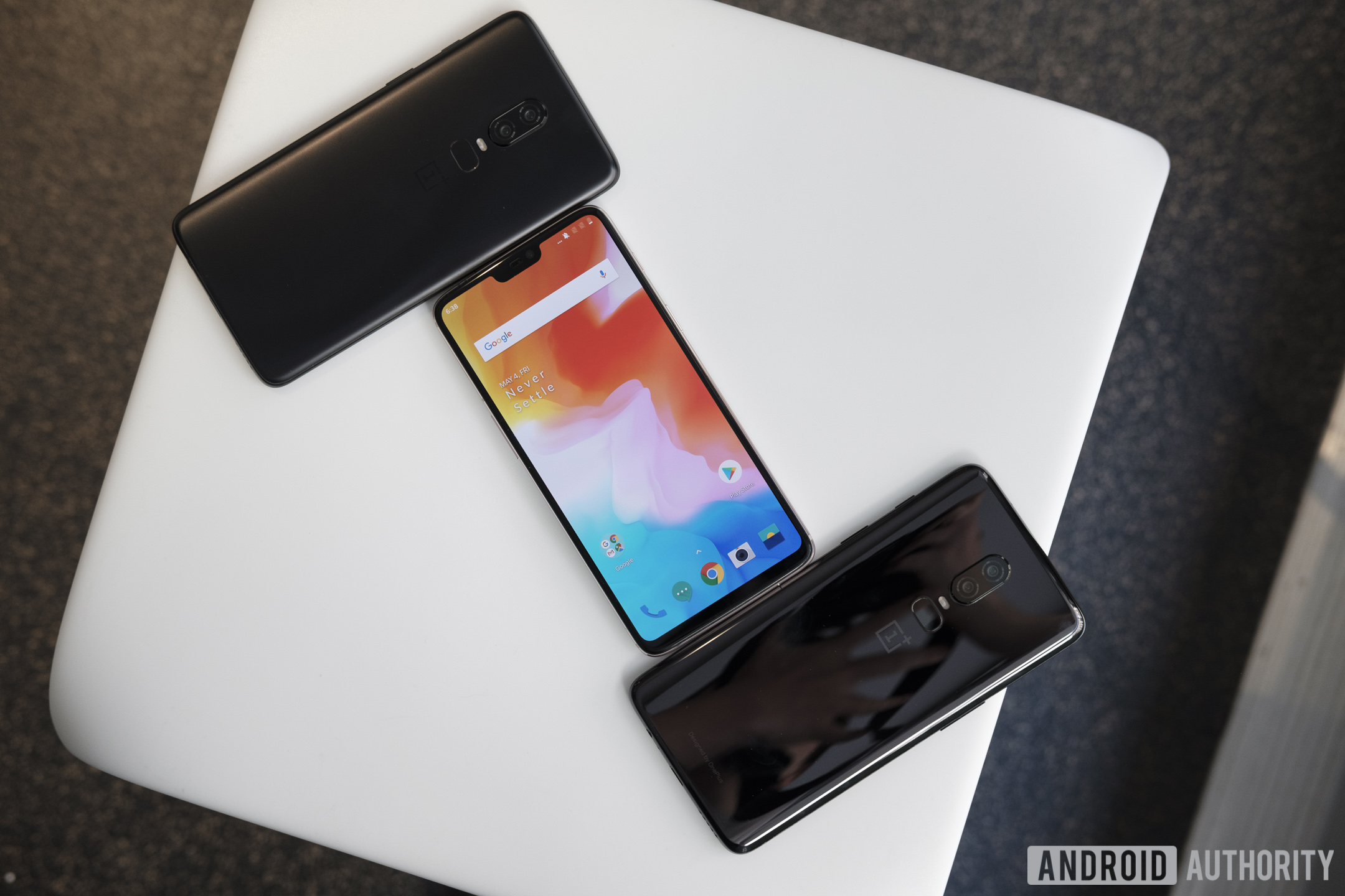 oneplus 6 three models on table