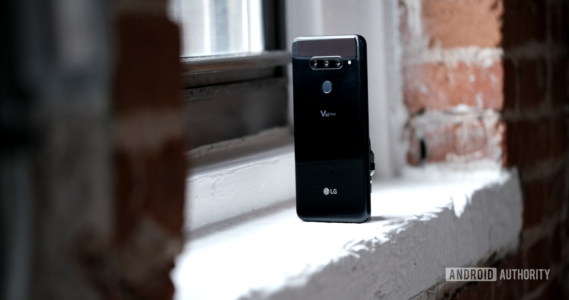 LG V40 ThinQ back on a window sill, LG V40 review