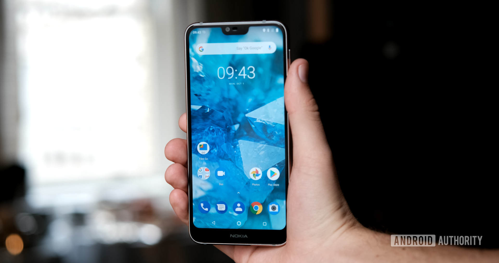 Nokia 7.1 holding and showing front of phone