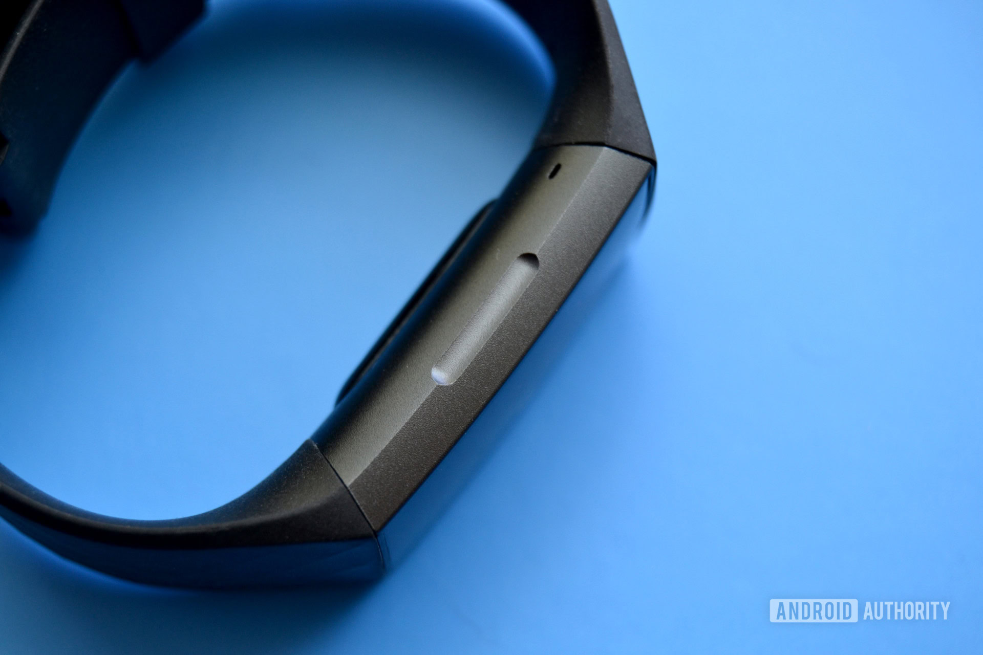 where is the fitbit charge 3 button