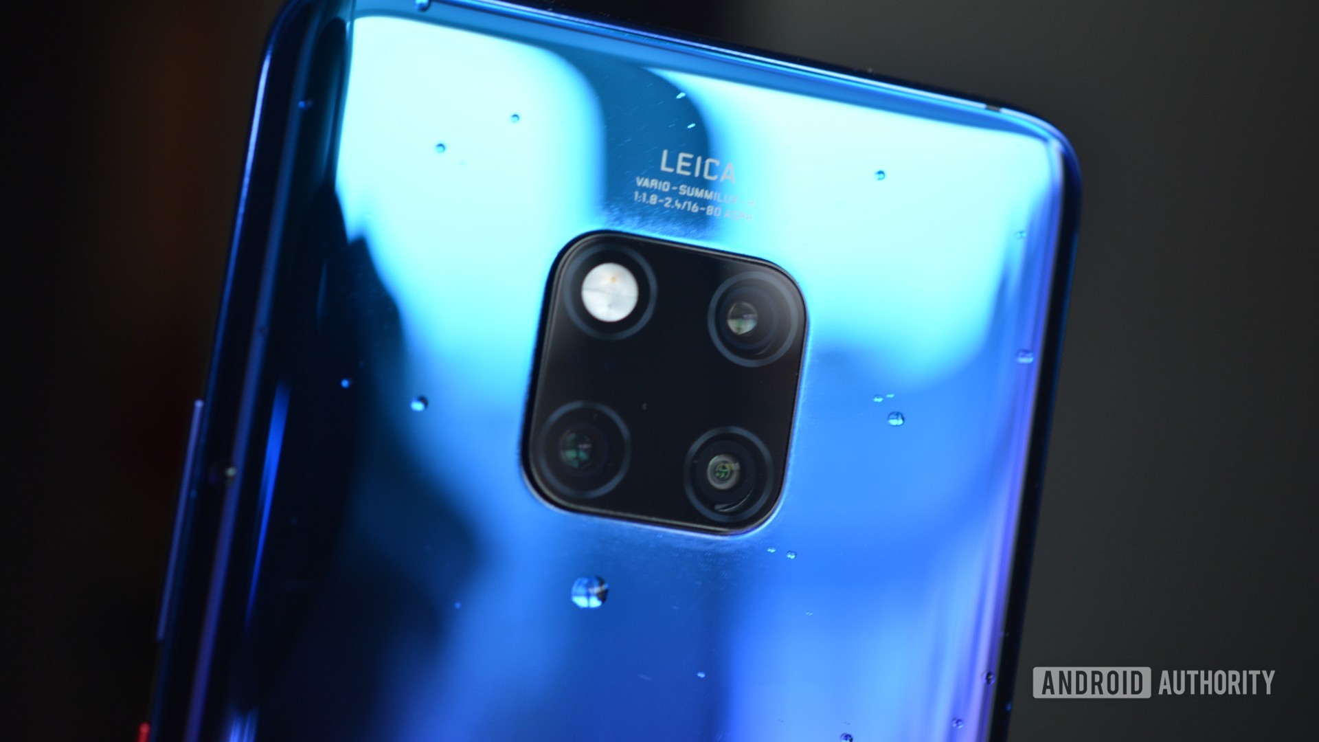 back of huawei mate 20 pro twilight with water droplets on it