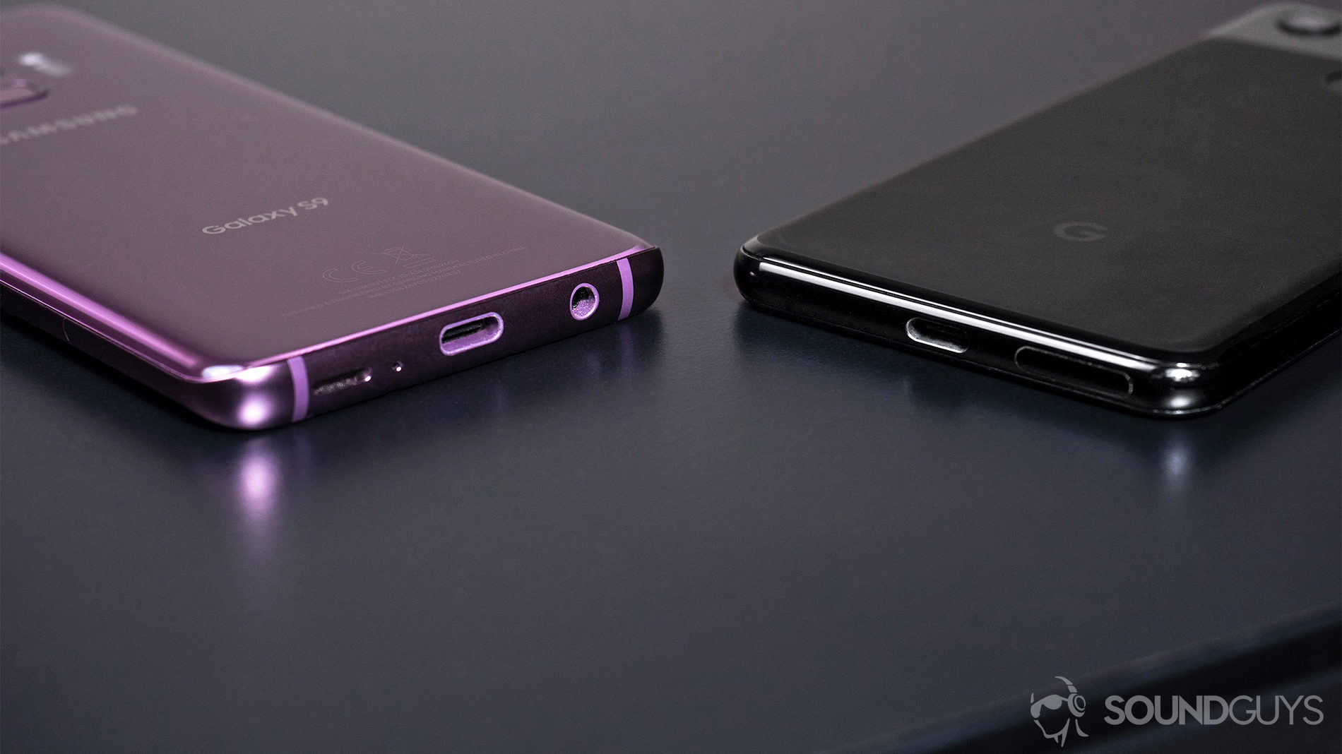 USB-C, headphone jack: Samsung S9 lilac and Google Pixel 3 with bases showing to reveal headphone jack and lack thereof.