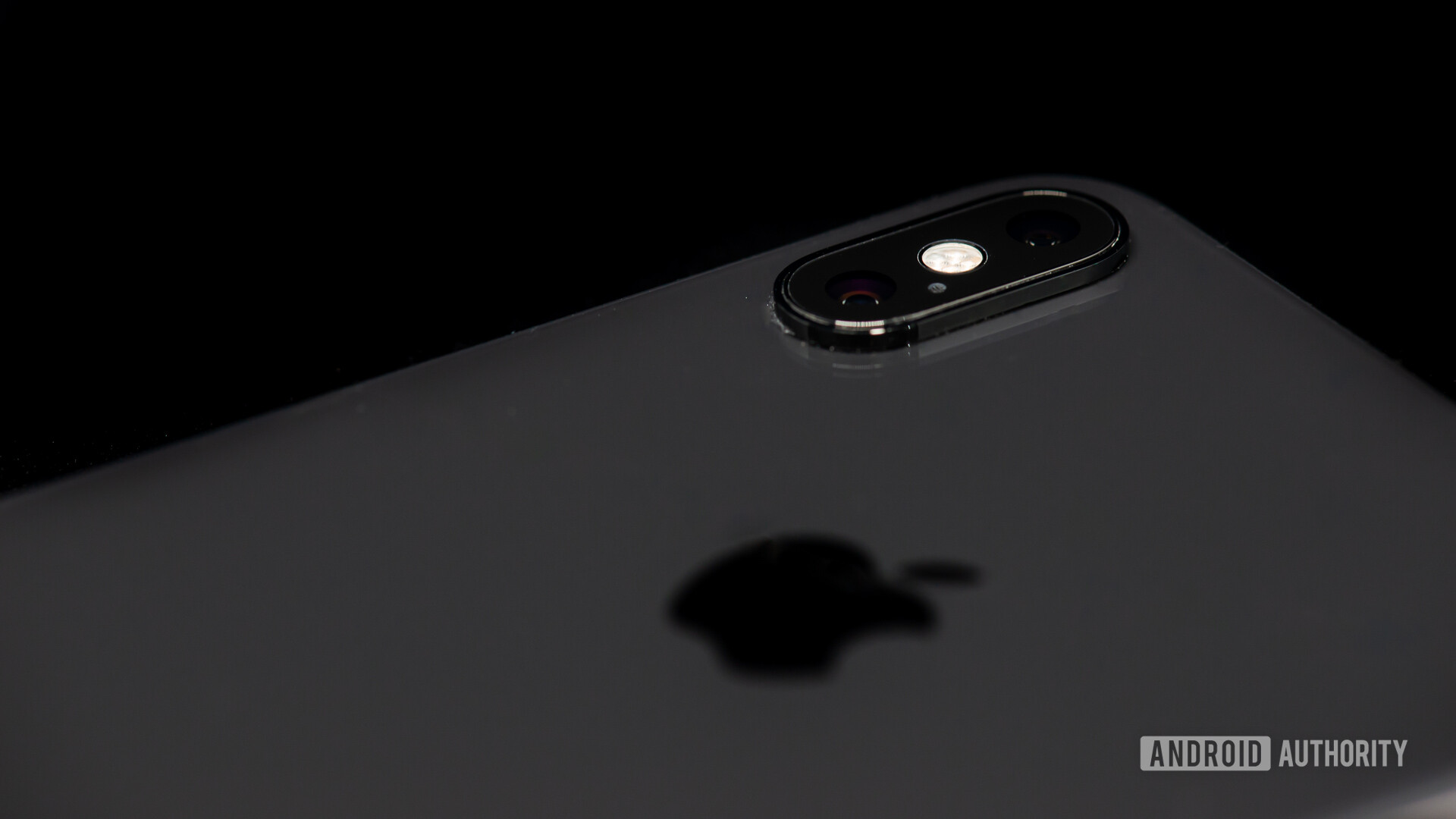 iPhone XS Max closeup on camera module and Apple logo