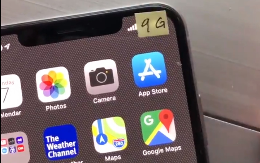 A 9G sticker on a smartphone.