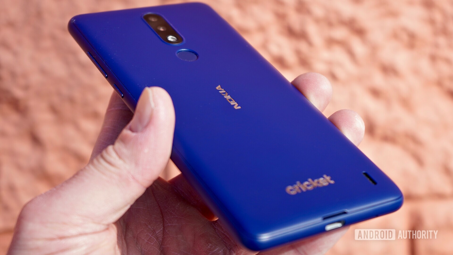 View of the Blue Nokia 3.1 Plus held in a hand.