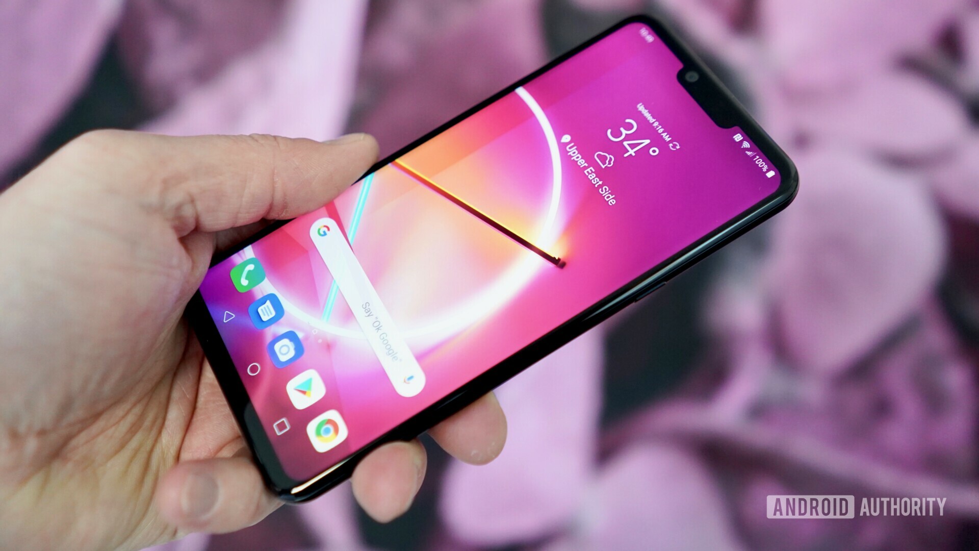 LG G8 ThinQ held in a hand at the MWC 2019 presentation.