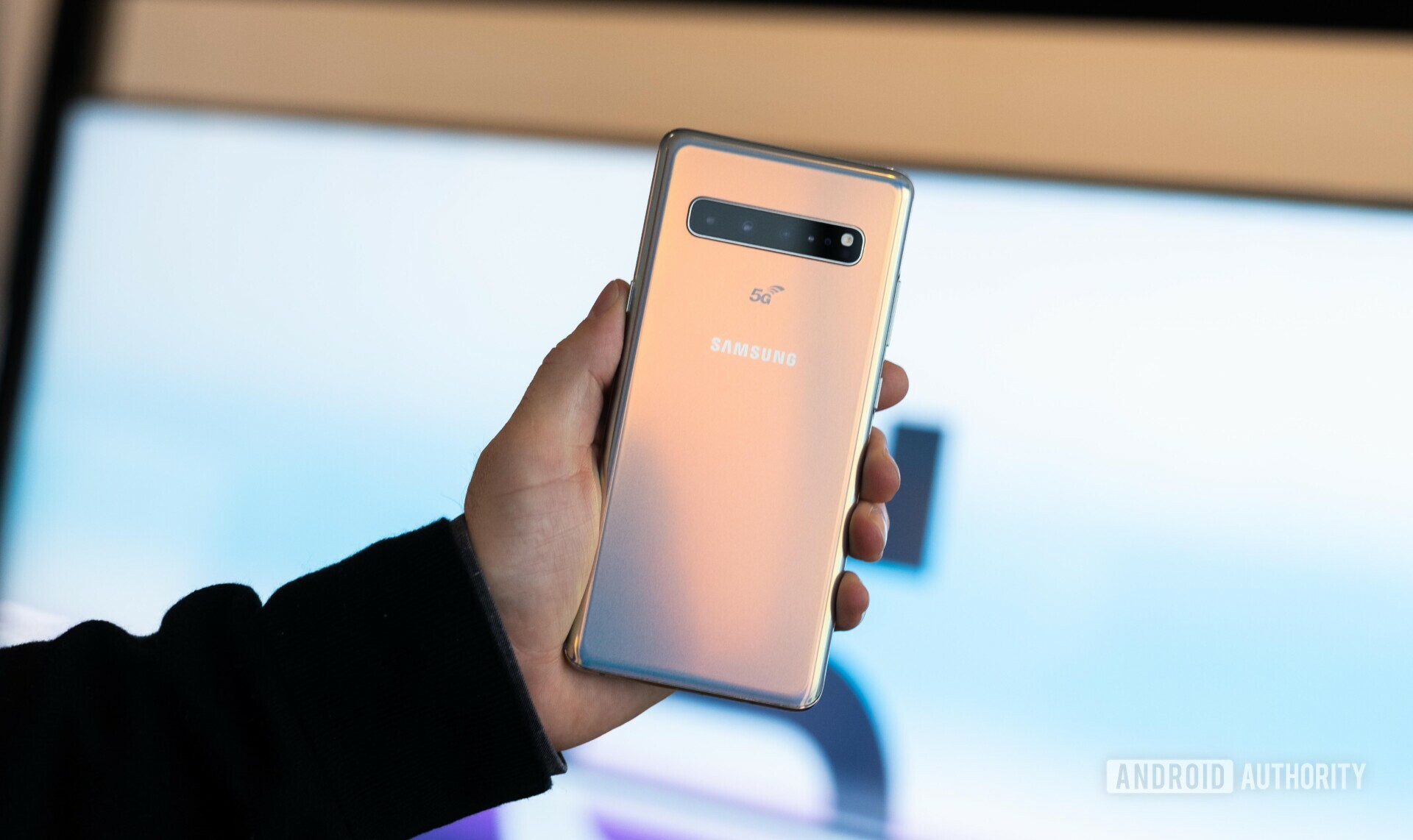 Backside photo of the new Samsung Galaxy S10 5G held in a hand.