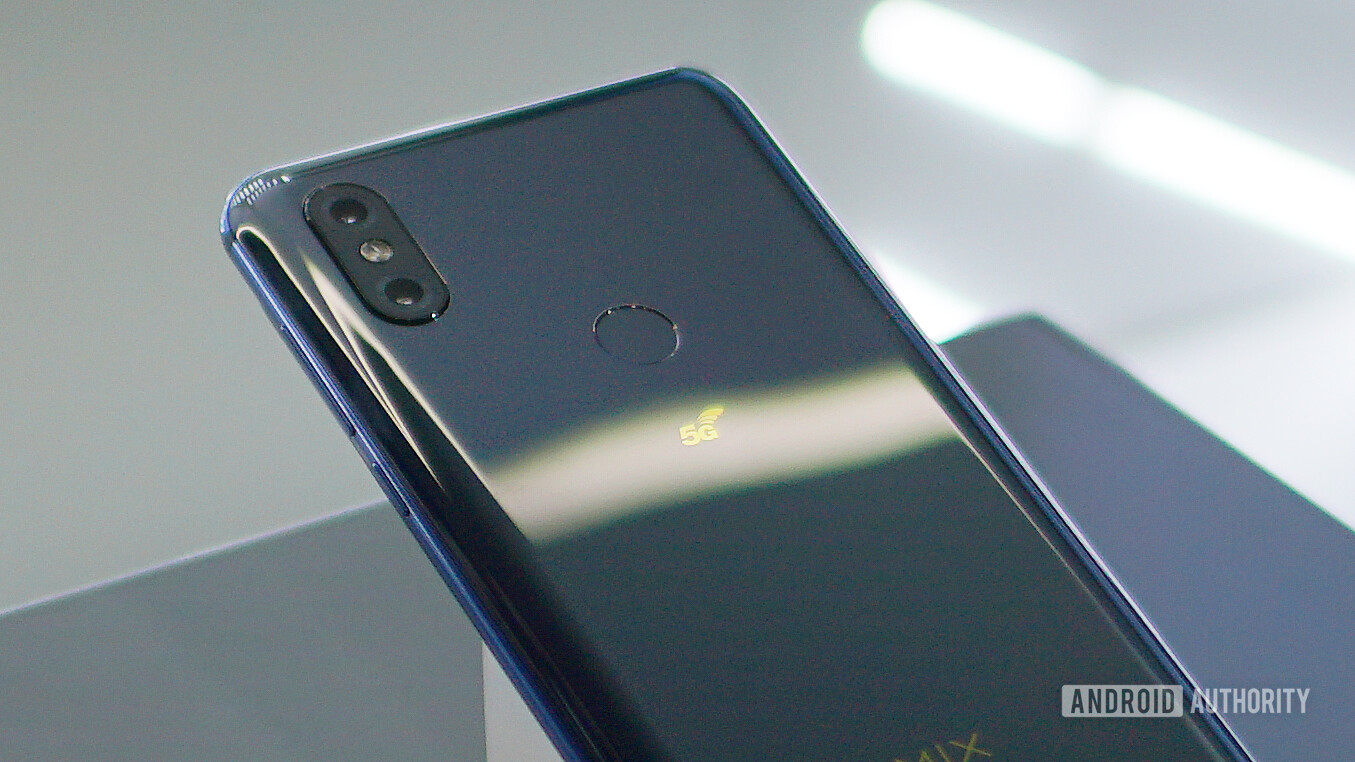 Bacside photo of the Xiaomi Mi Mix 3 5G showing the logo, fingerprint scanner and dual cameras.