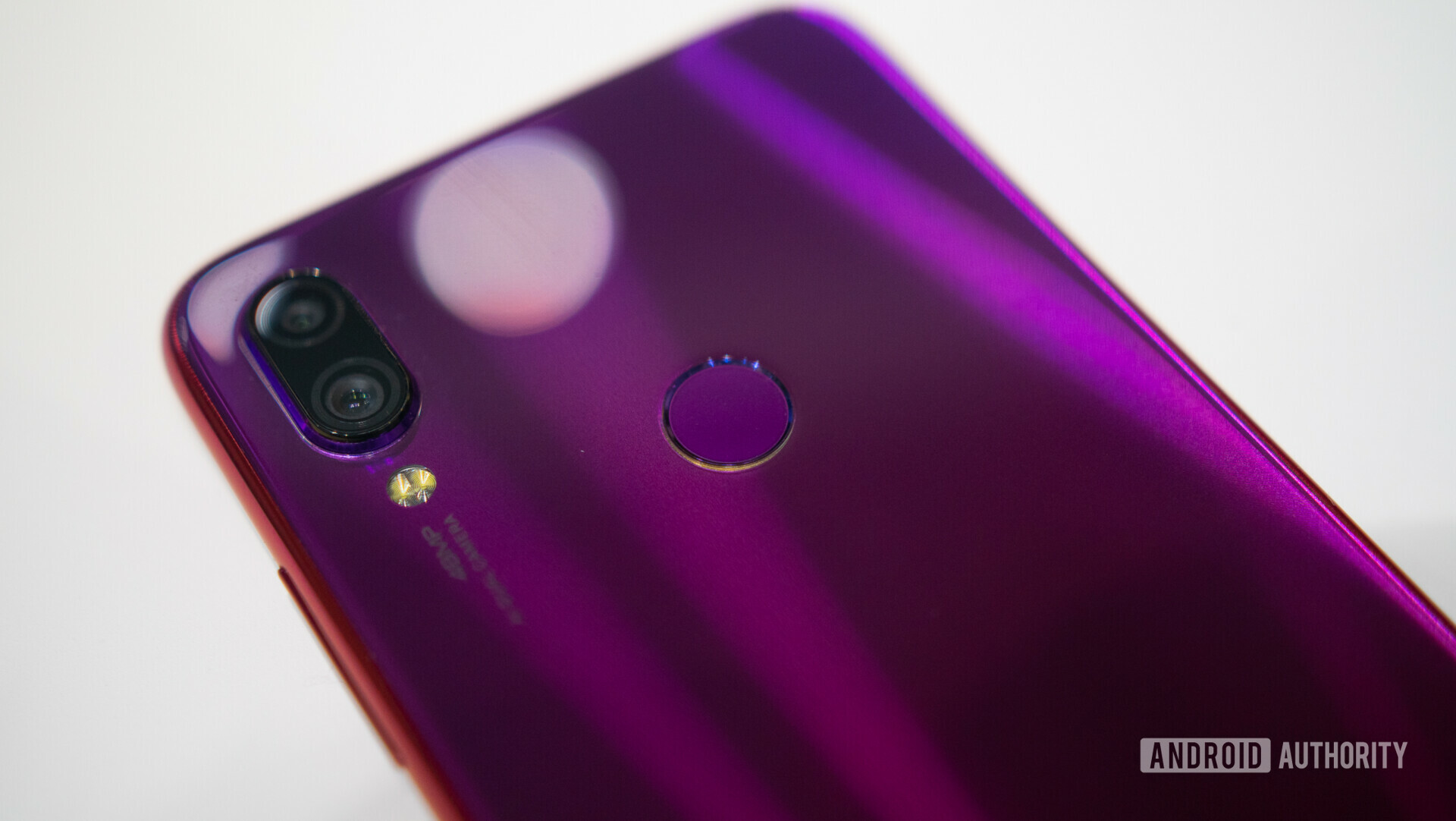 Backside photo of the Xiaomi redmi Note 7 focusing on the dual cameras and fingerprint sensor.
