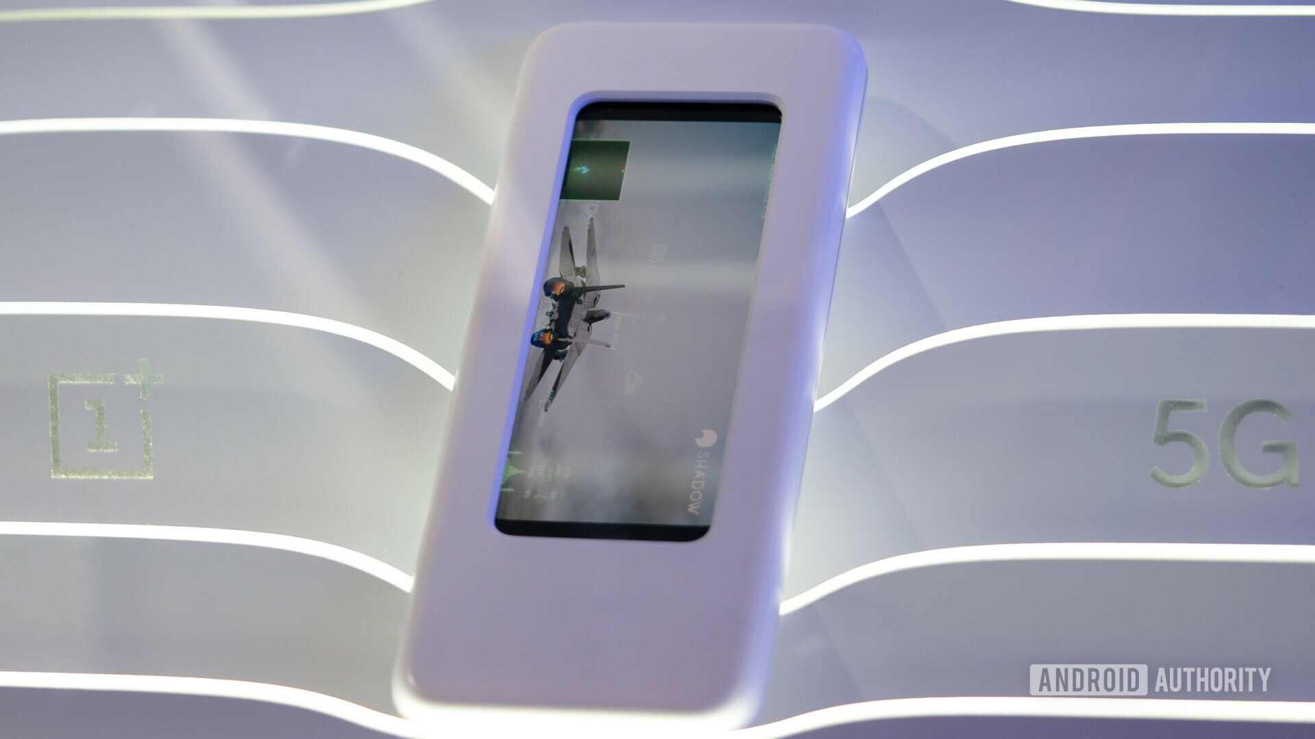 An image of the OnePLus 5G smartphone prototype in a concealing case at Mobile World Congress 2019.