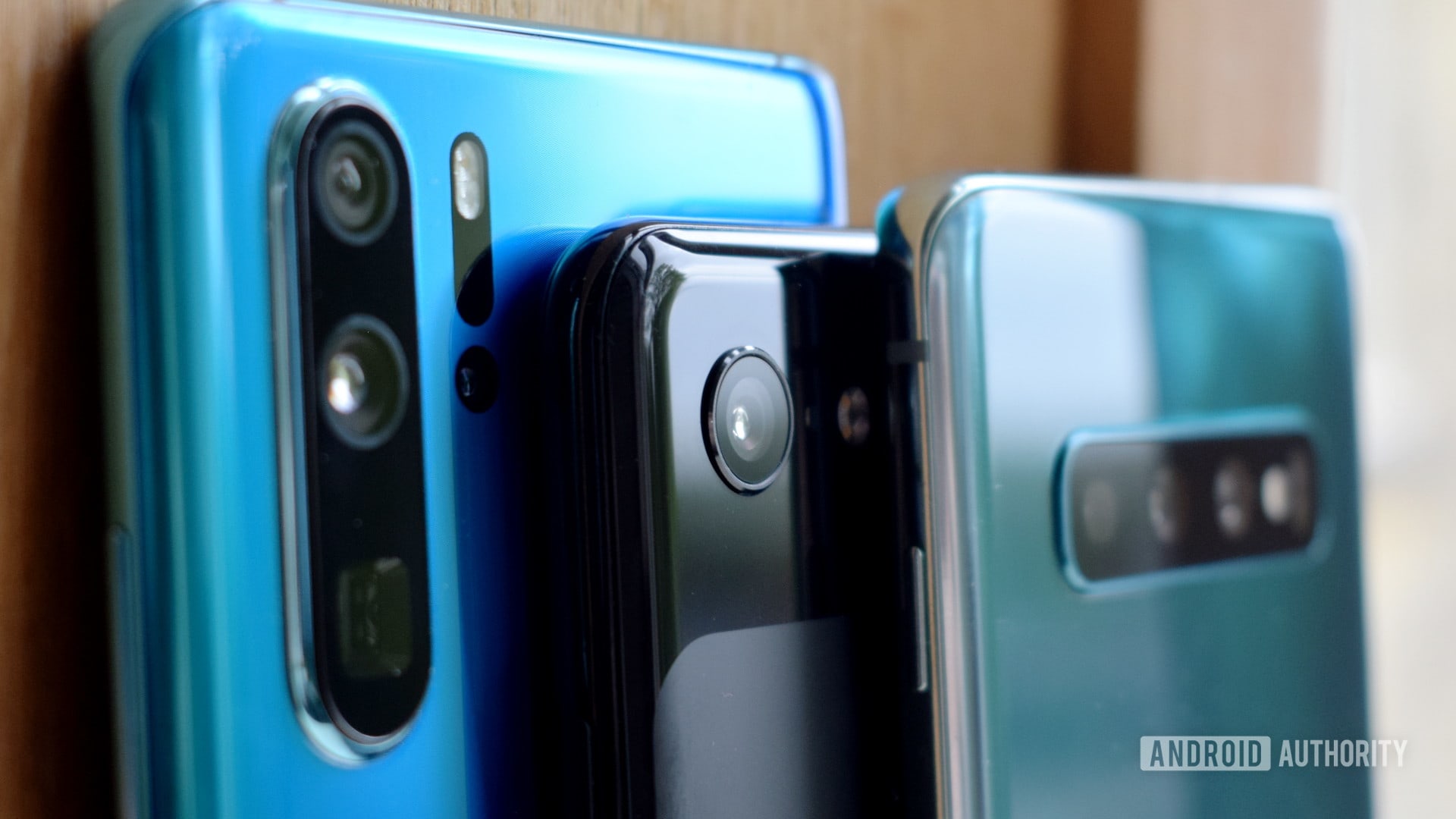 Google Pixel 3 camera in focus, with Huawei P30 Pro and Galaxy S10 besides