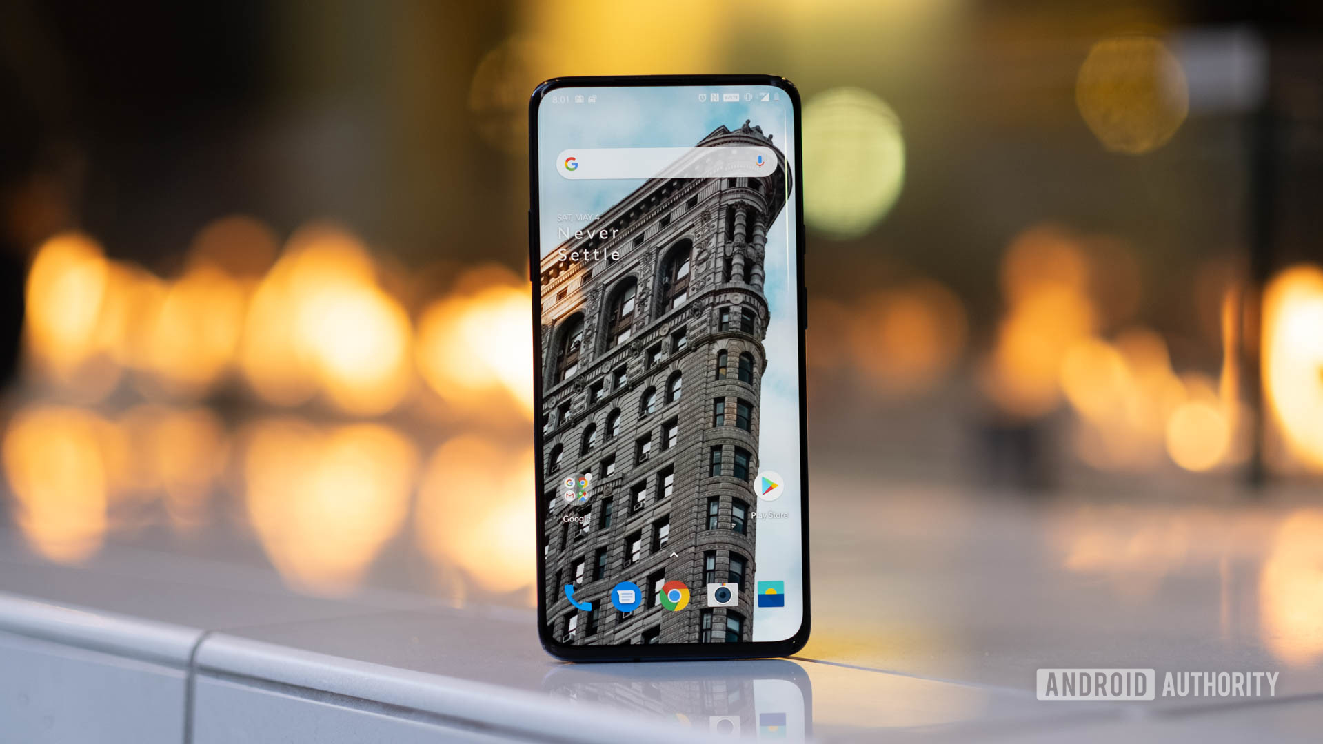 OnePlus 7 Pro screen in front of the fire