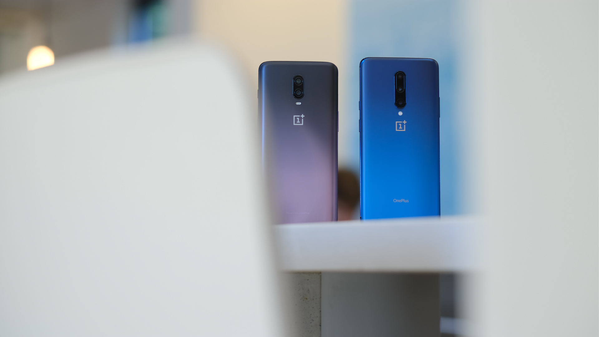 OnePlus 7 Pro vs OnePlus 6T backs on tables