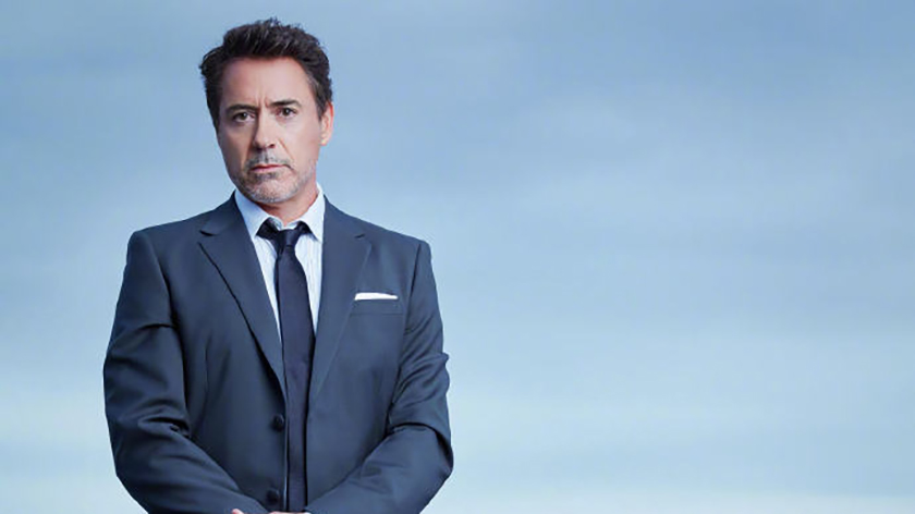 Actor Robert Downey Jr. holding a OnePlus 7 Pro in a promotional photo for the company.