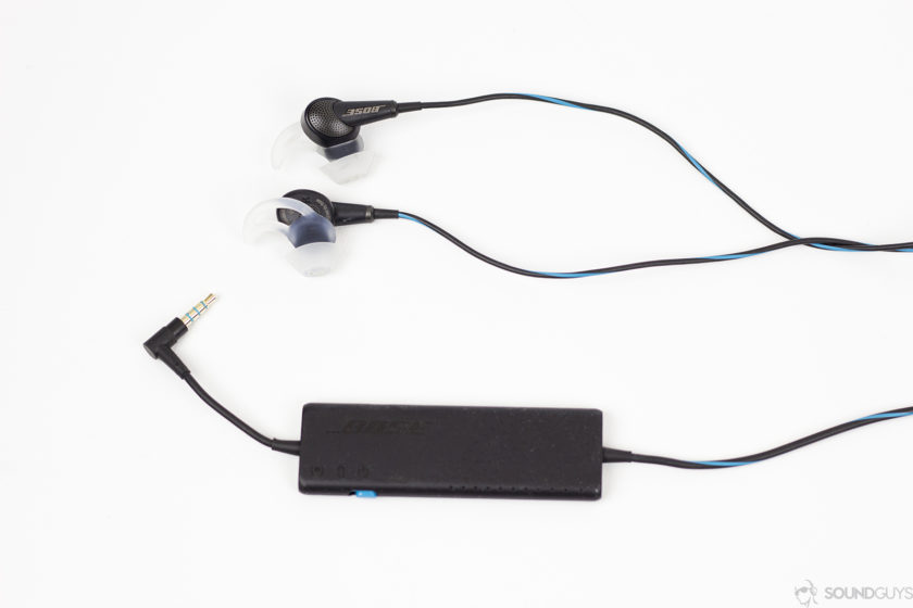 Pictured is the earbuds and control module of the Bose QC20. 