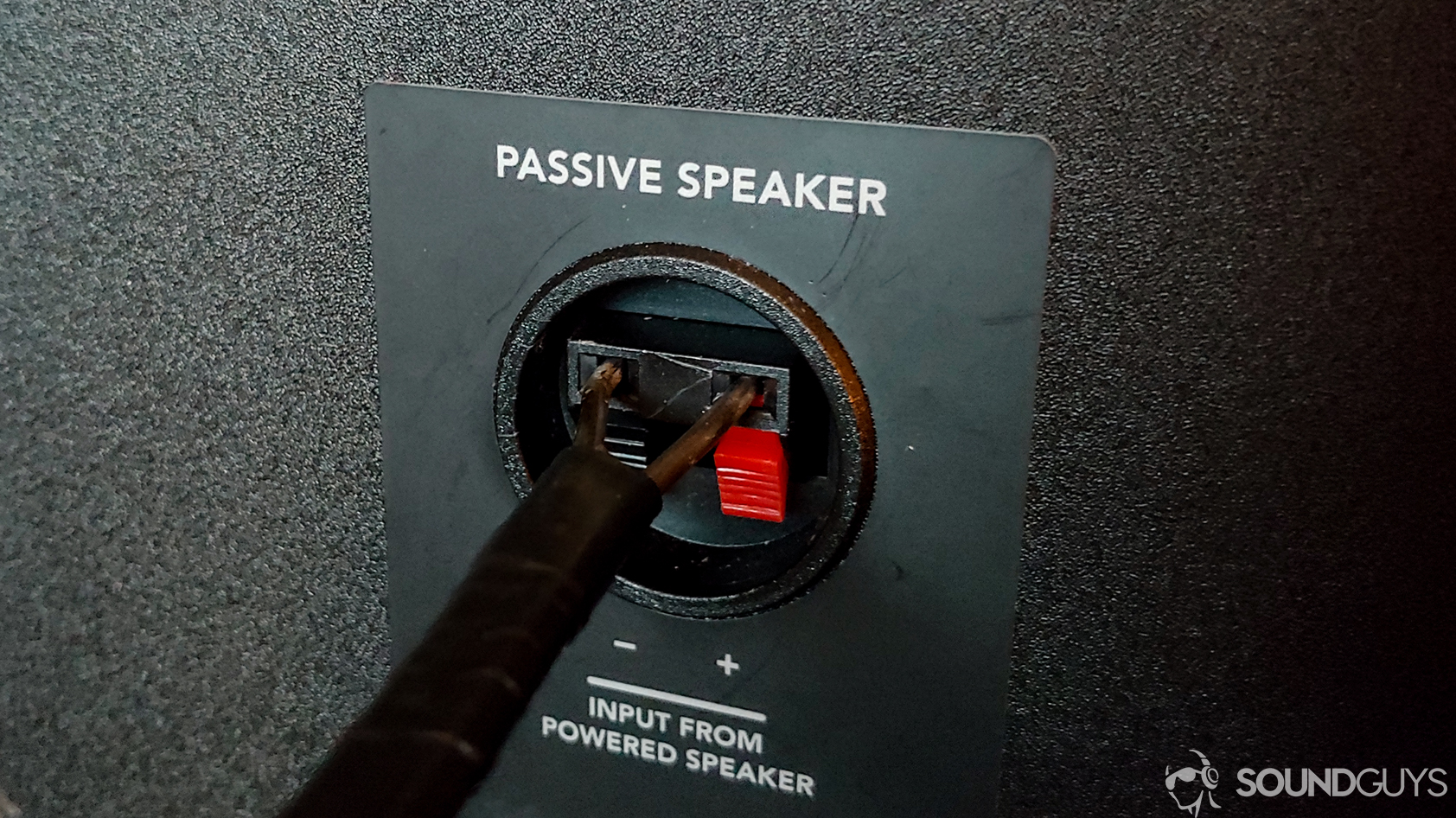 Coat hanger cable in a passive speaker.