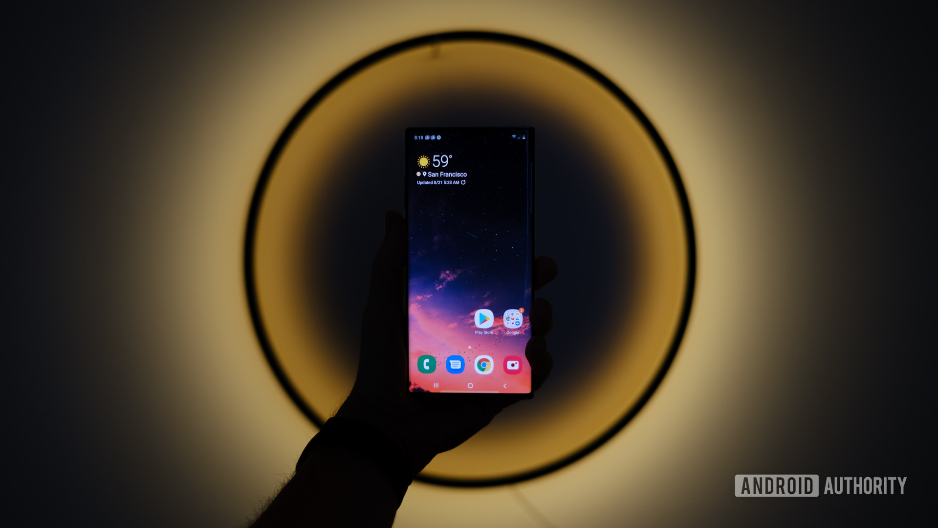 Samsung Galaxy Note 10 Plus screen in front of lamp