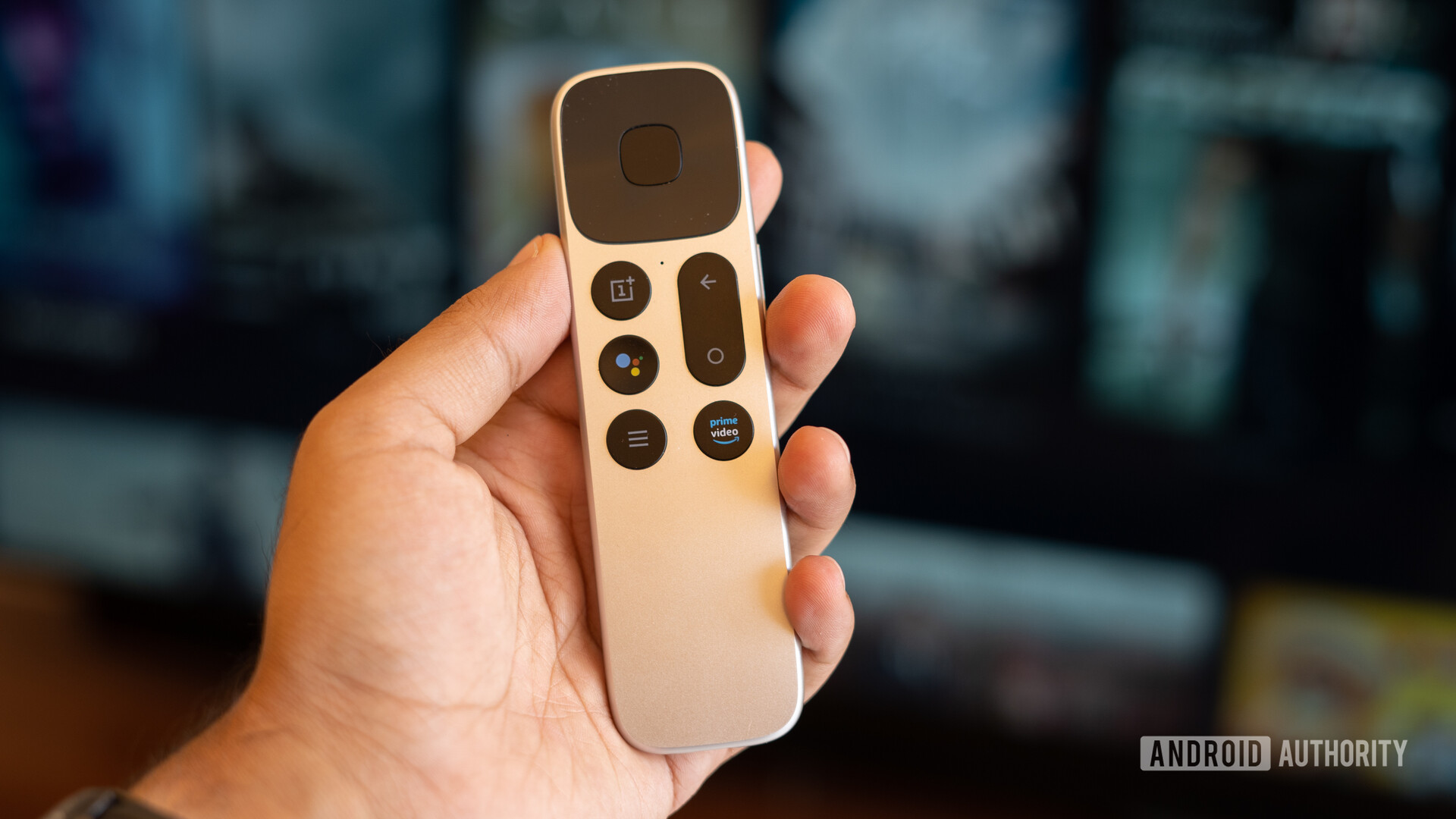 OnePlus TV showing the front of the remote in hand
