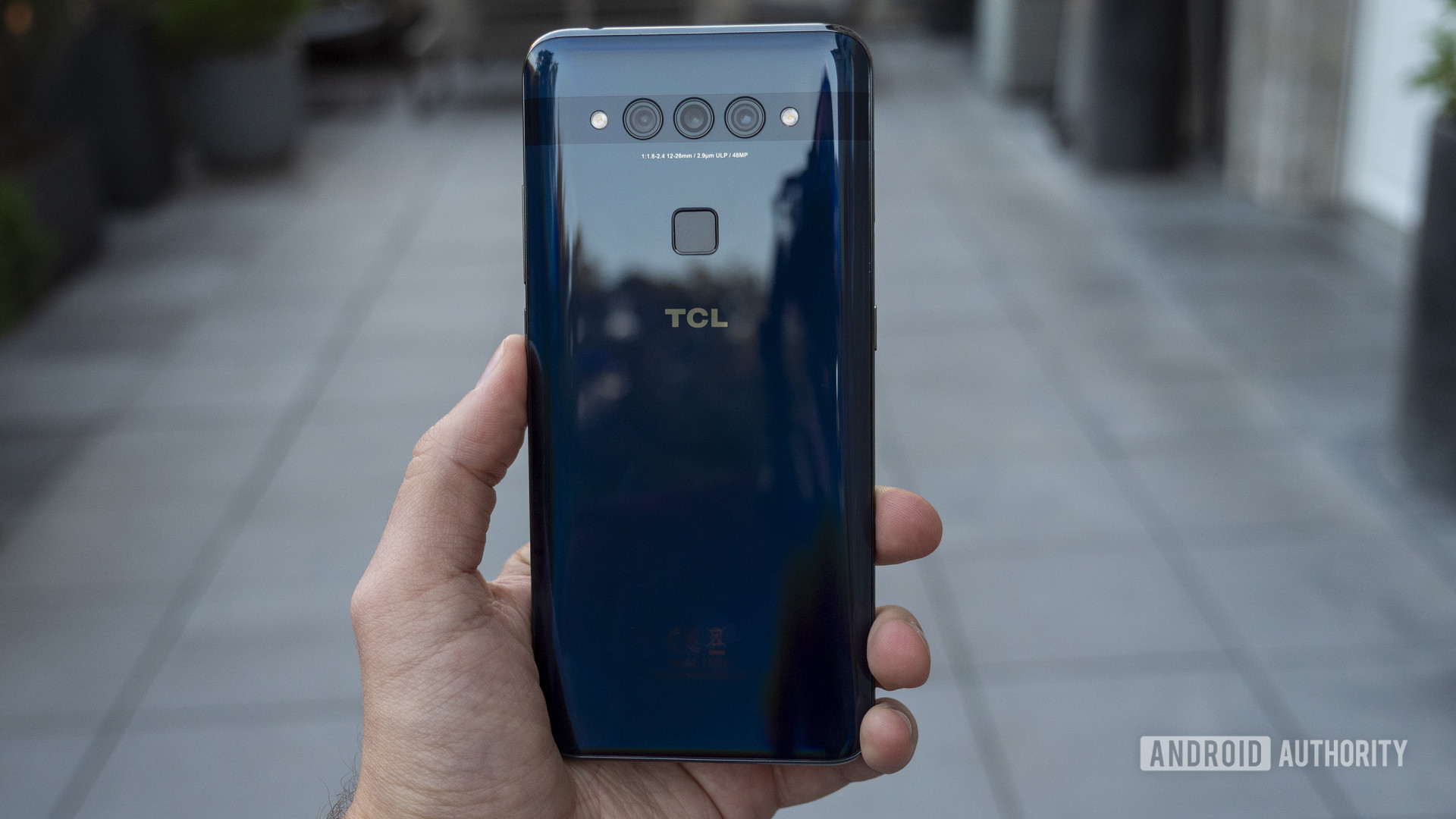 TCL Plex hands on blue in hand rear cameras 4