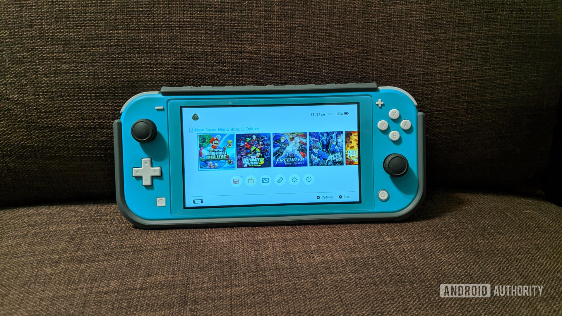 Nintendo Switch Lite on a couch