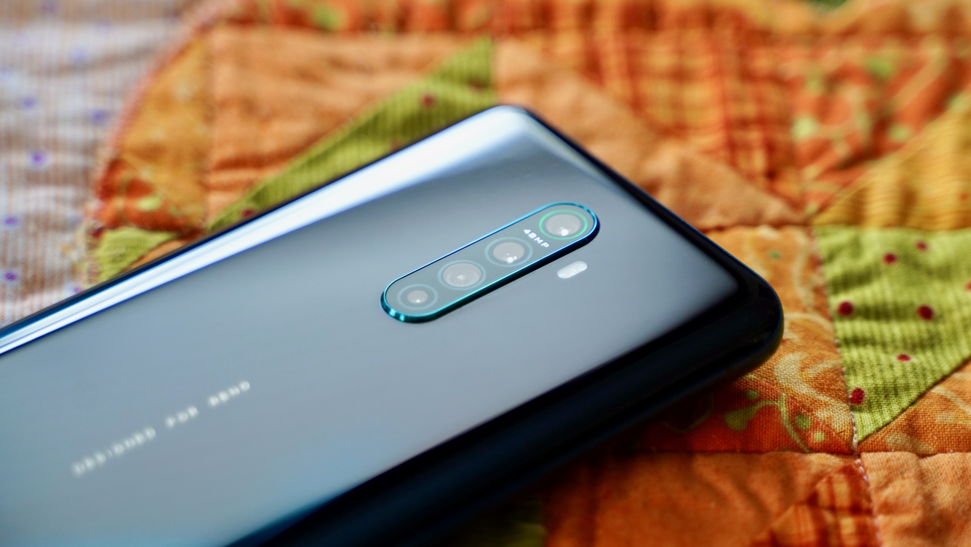 Oppo Reno Ace review camera module colorful background
