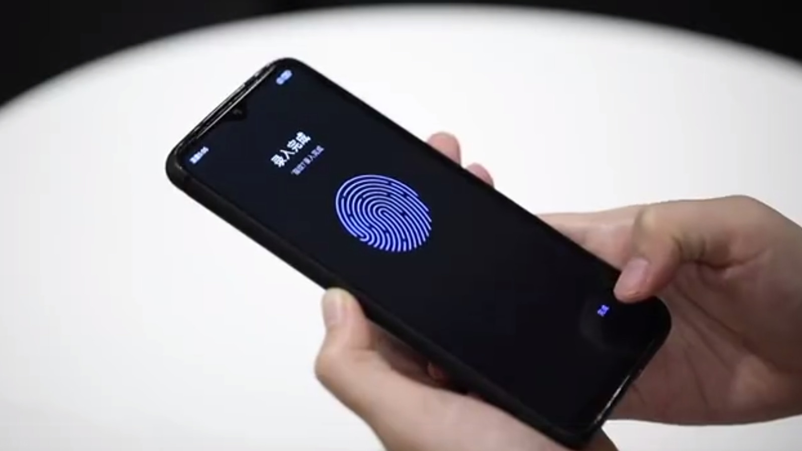 A Xiaomi Redmi phone with an in-display fingerprint sensor for LCD screens.