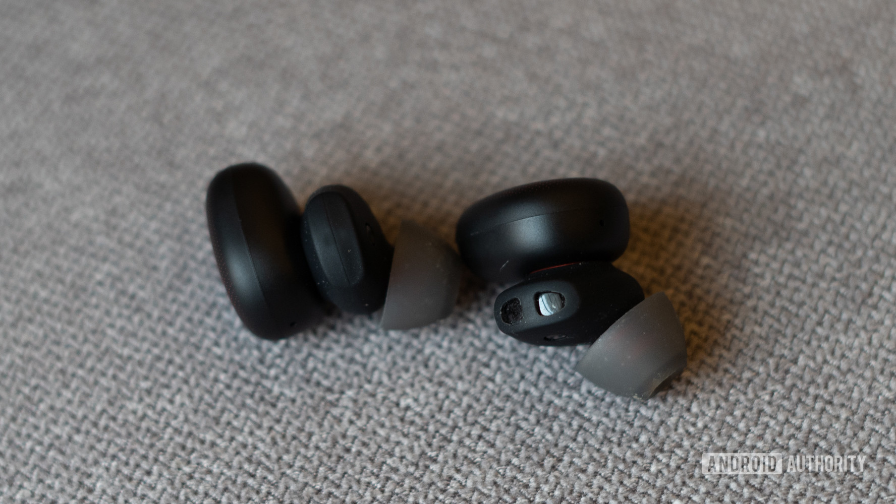 Amazfit Powerbuds Review with heart rate sensor visible