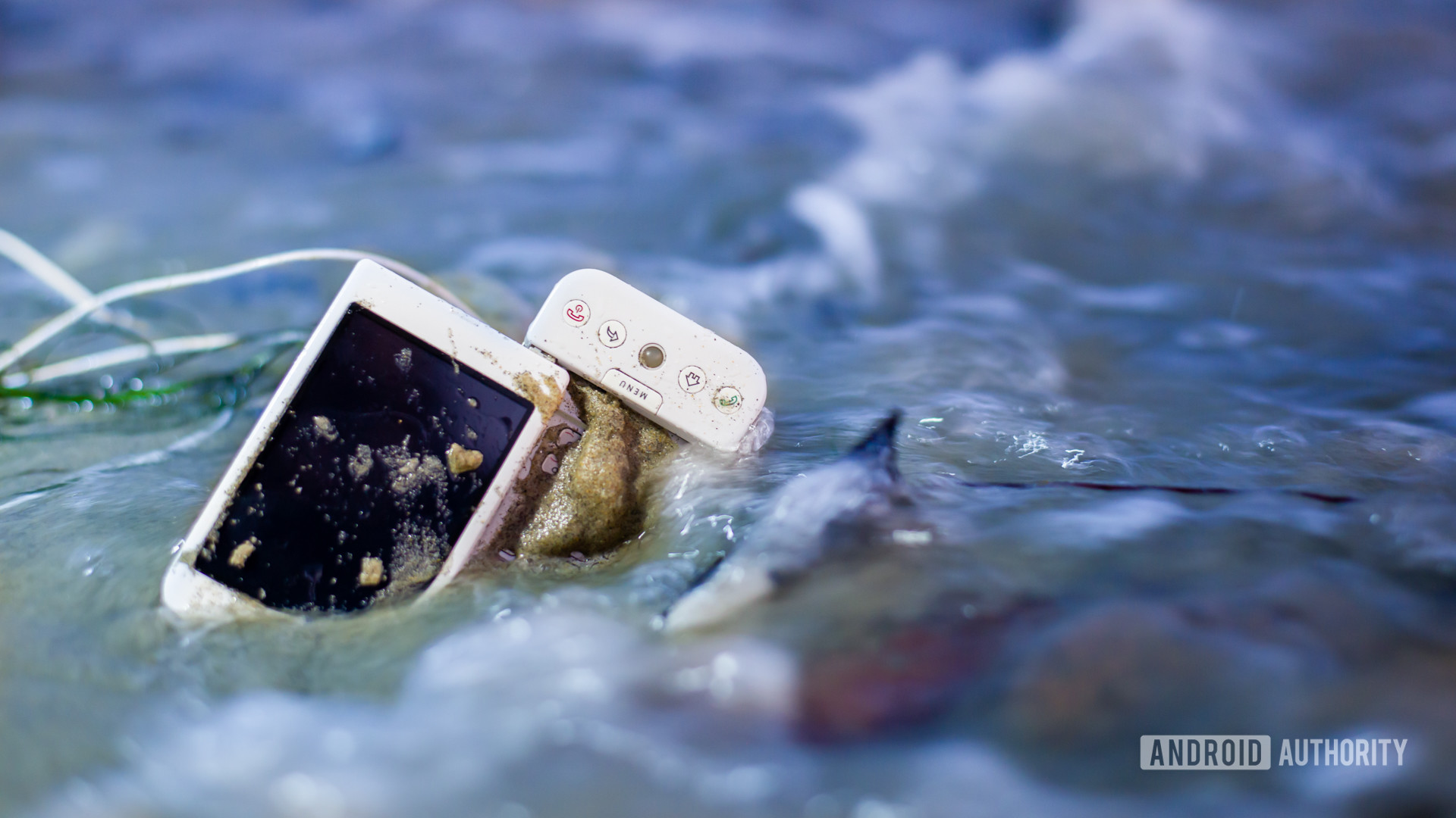 E Waste smartphone on beach2