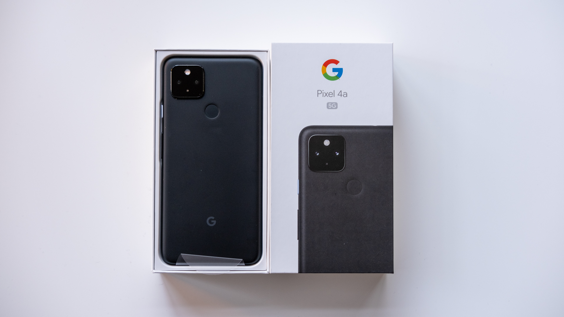 Google Pixel 4a 5G next to box 1