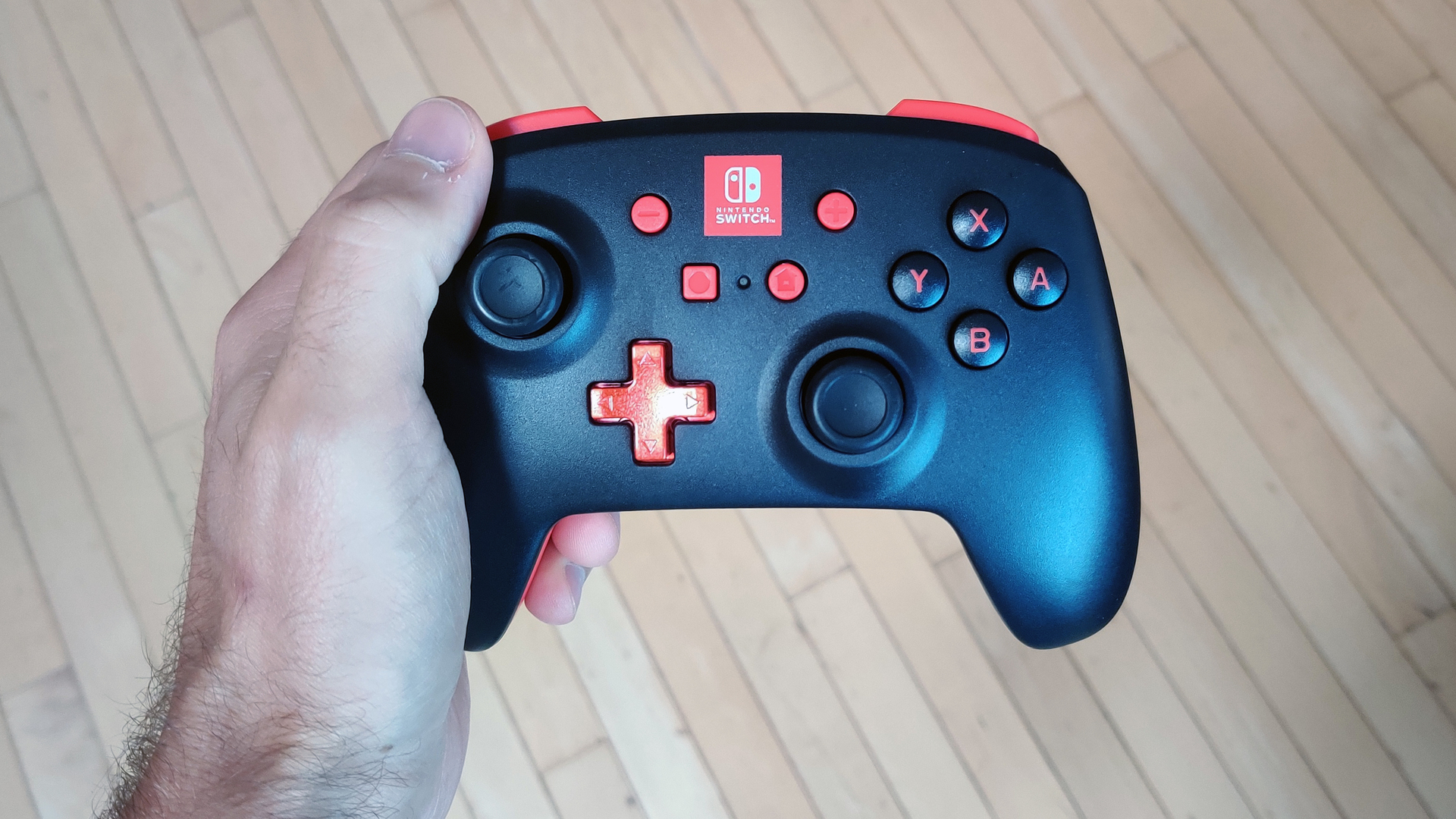 PowerA Enhanced Wireless Controller for Nintendo Switch in hand
