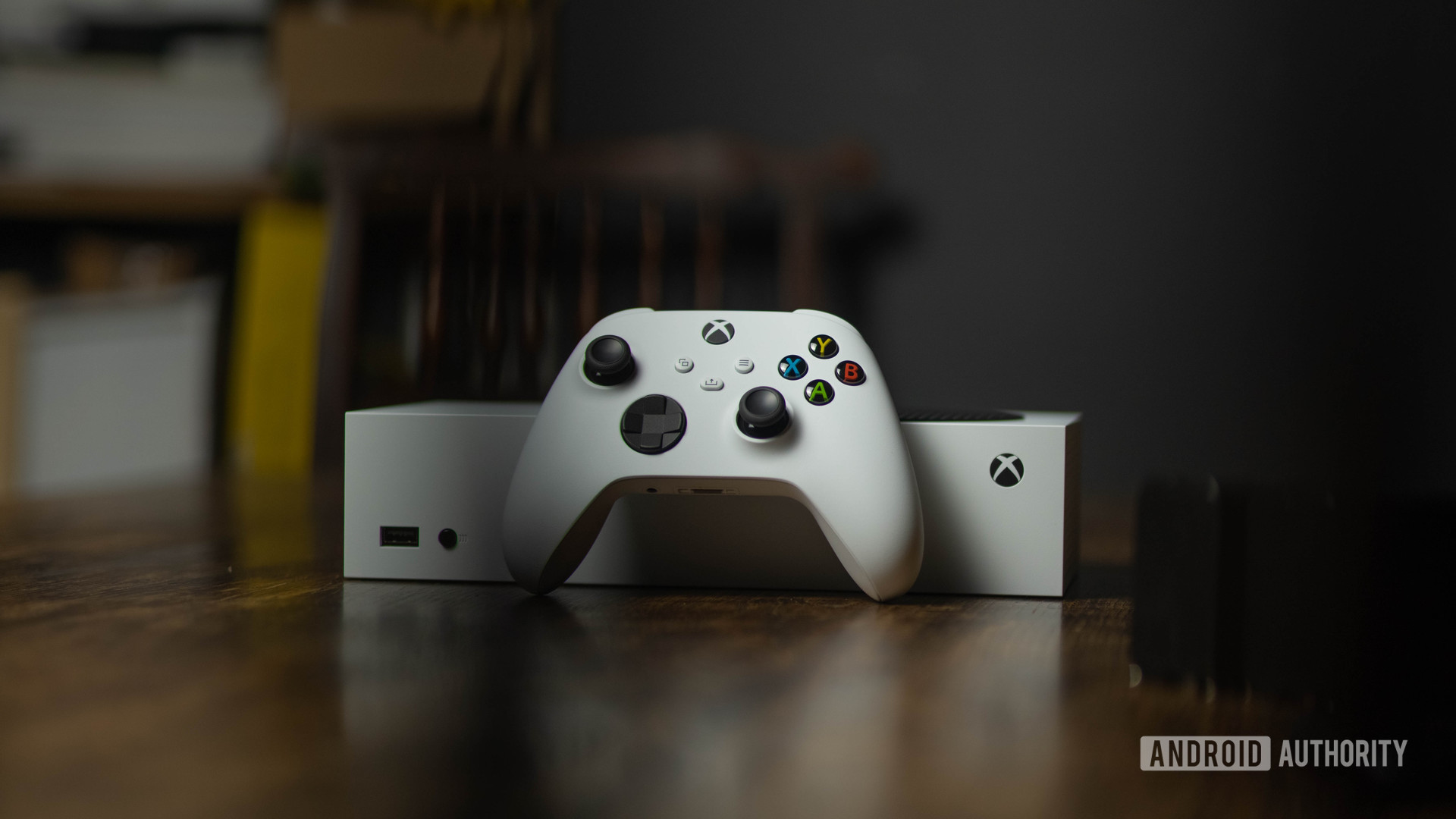 Xbox Series S controller and console with foreground bokeh