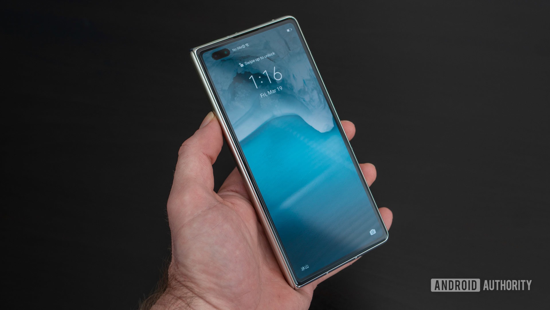 Huawei Mate X2 lock screen in hand
