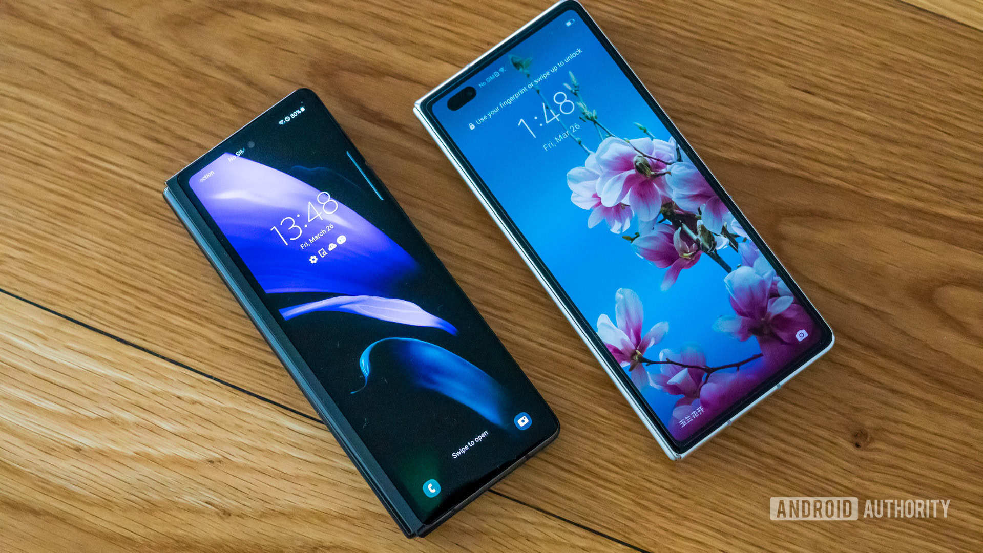 Huawei Mate X2 vs Samsung Galaxy Z Fold 2 external screen face up on table