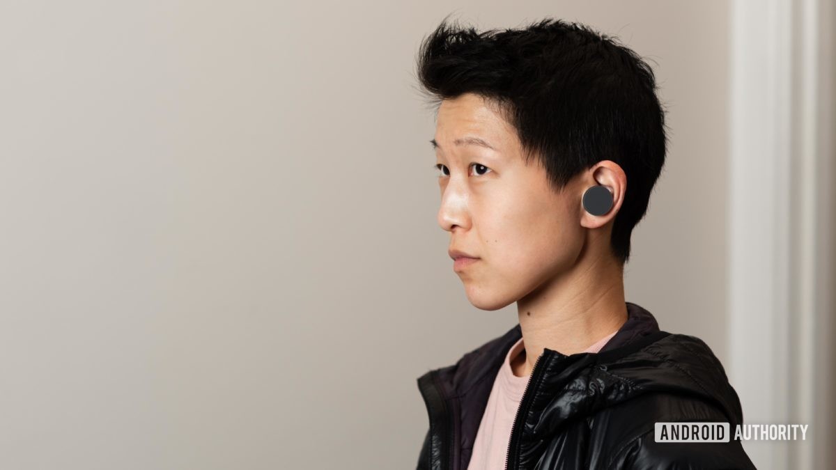 Microsoft Surface Earbuds true wireless earbuds woman wears 1