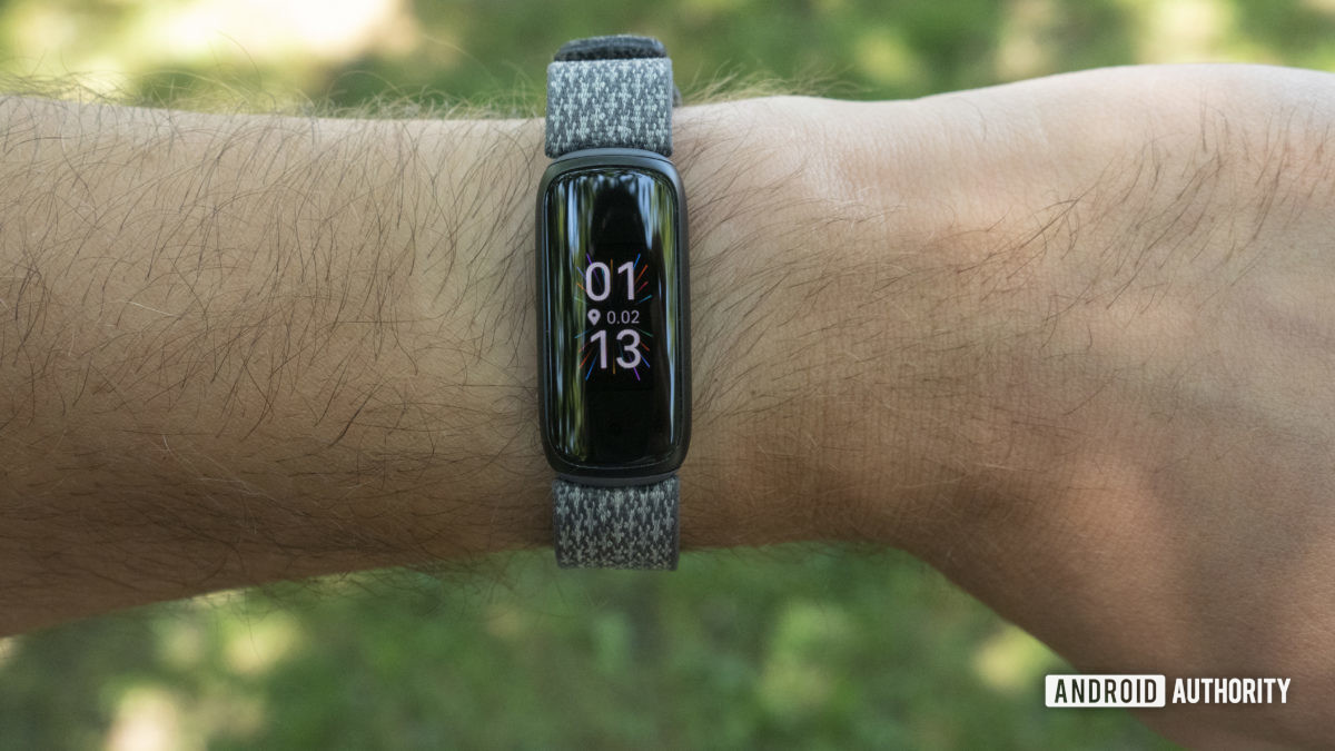 fitbit luxe review on wrist watch face slate woven strap