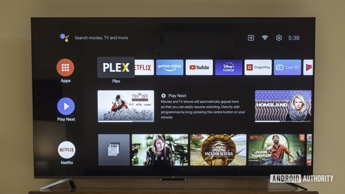 The OnePlus TV U1S showing the Android TV interface.