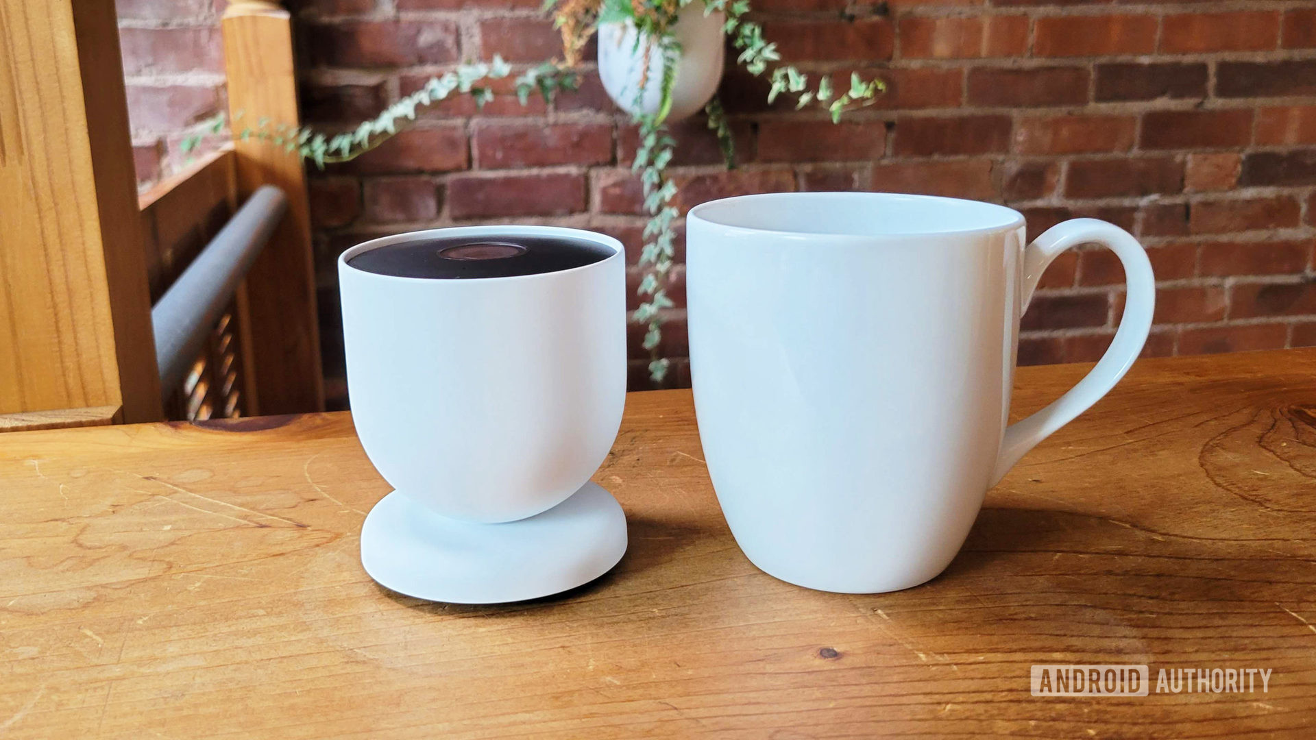 Google Nest Cam Review 2021 Next To Coffee Mug