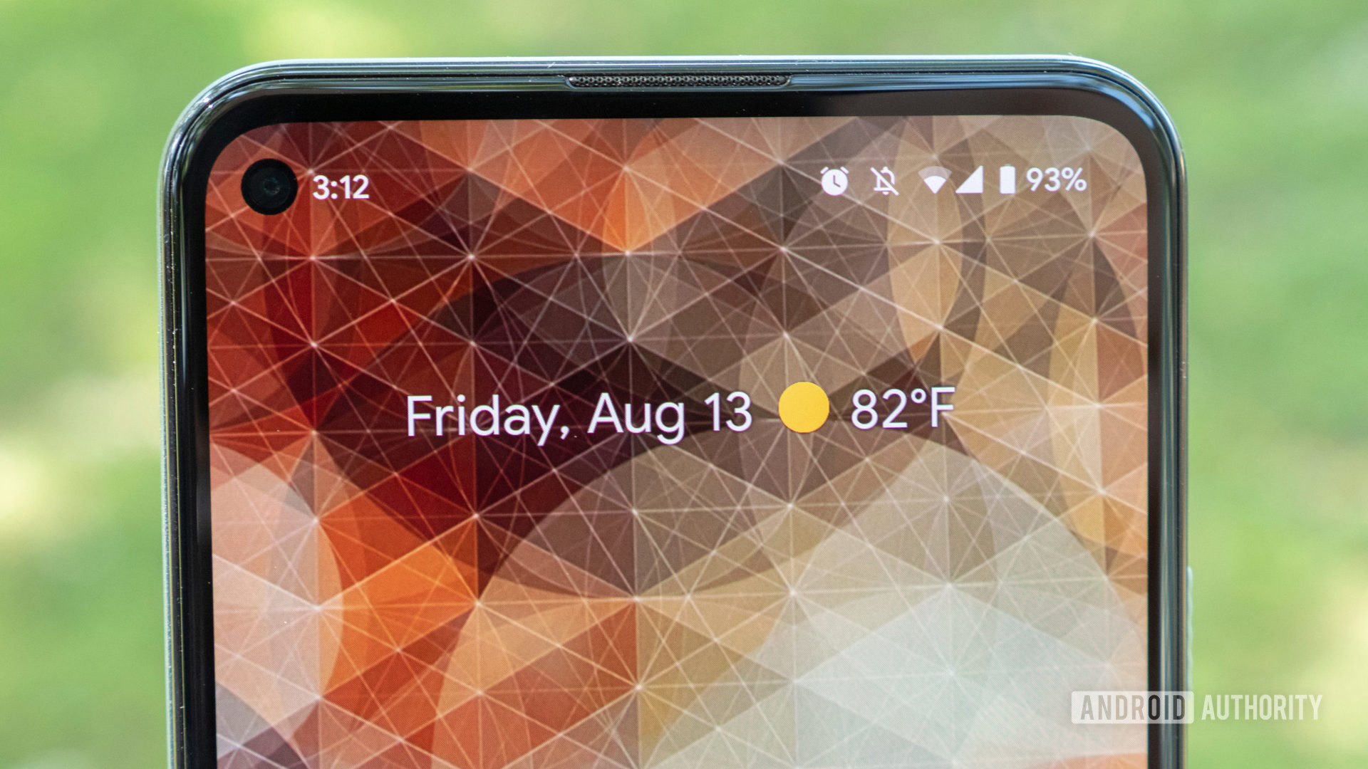 a close up of the google pixel 5a home screen at a glance widget on the display