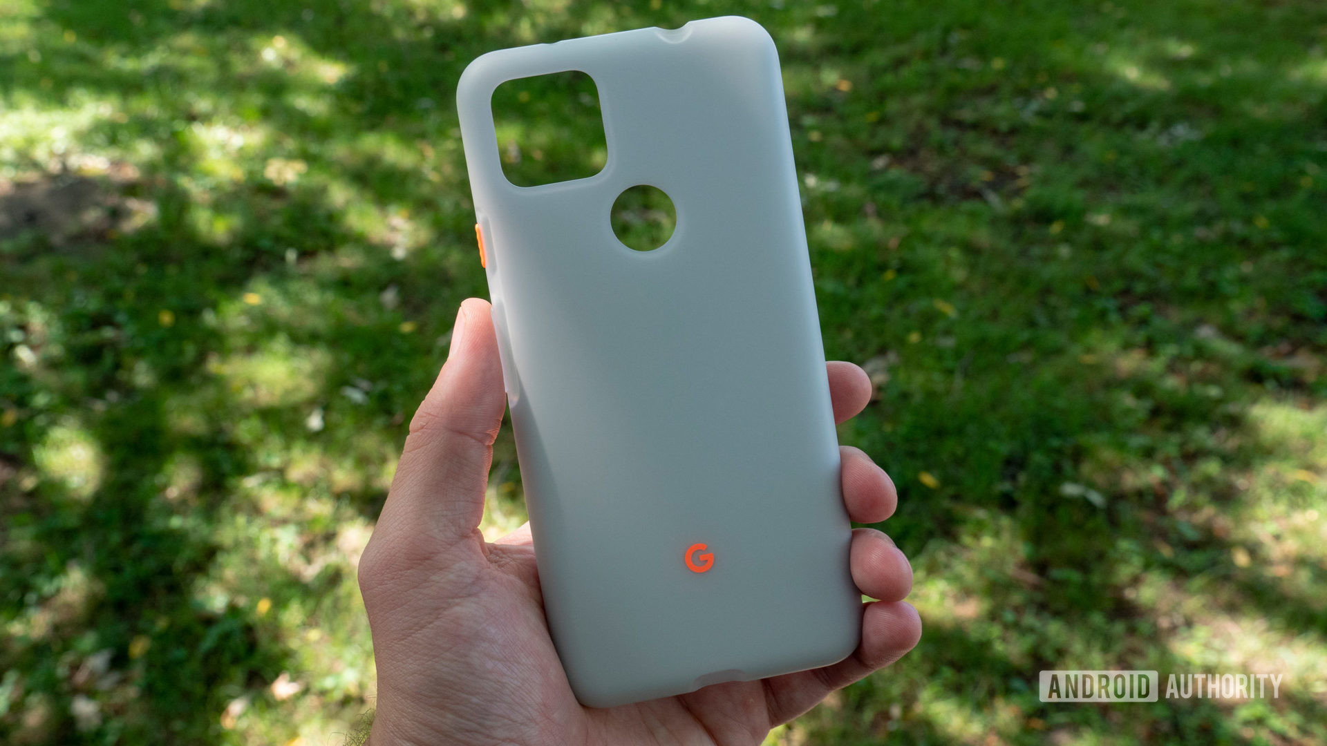 The Google Pixel 5a case in Maybe Moon held in a hand