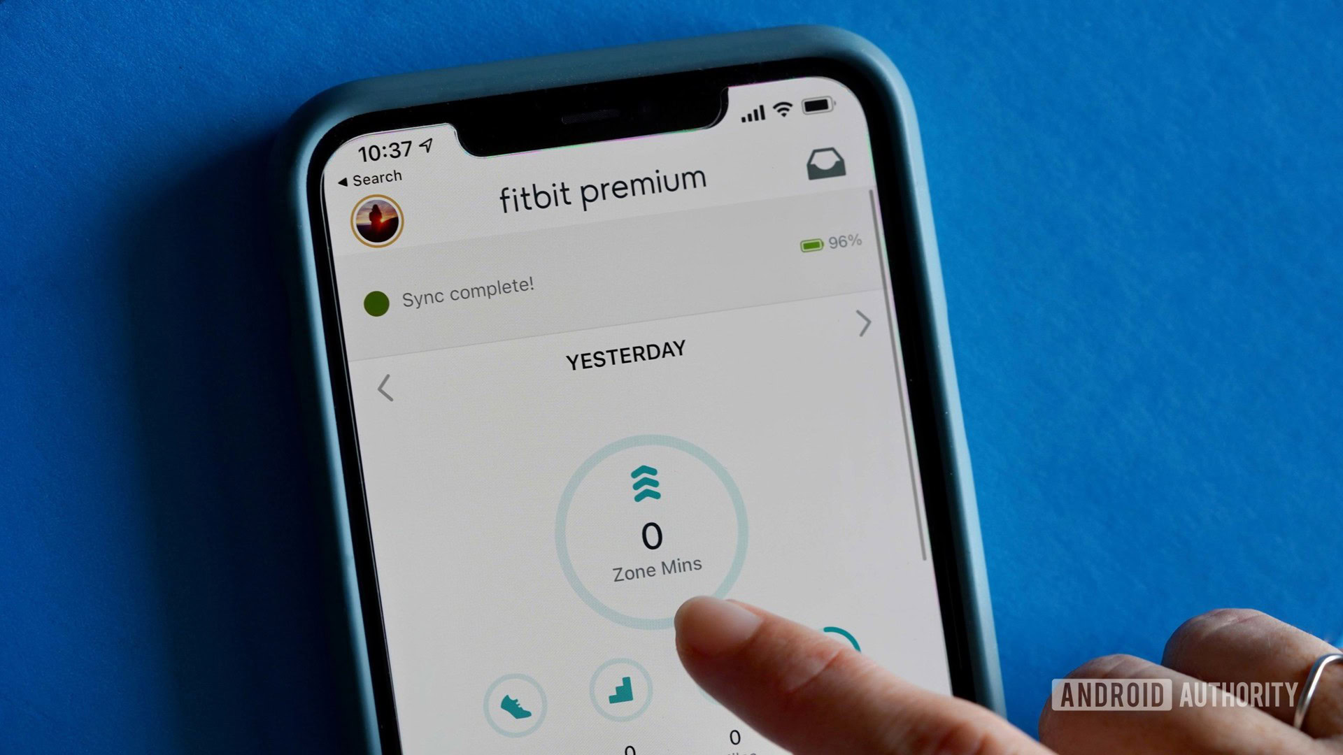 A Fitbit user Syncs their device by pulling down on the Today tab in the Fitbit app.