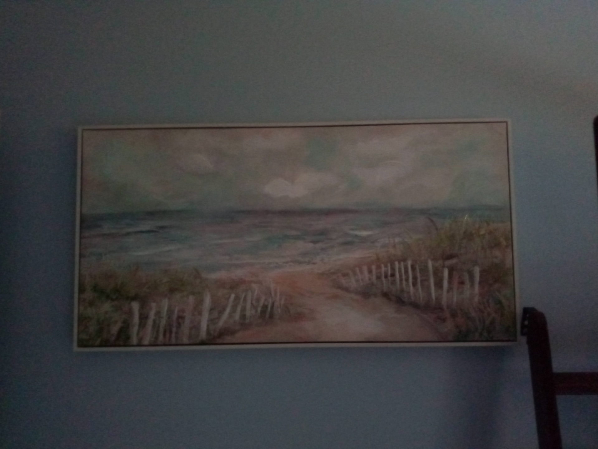 A low light AI Cam image of a painting taken with the LG K51