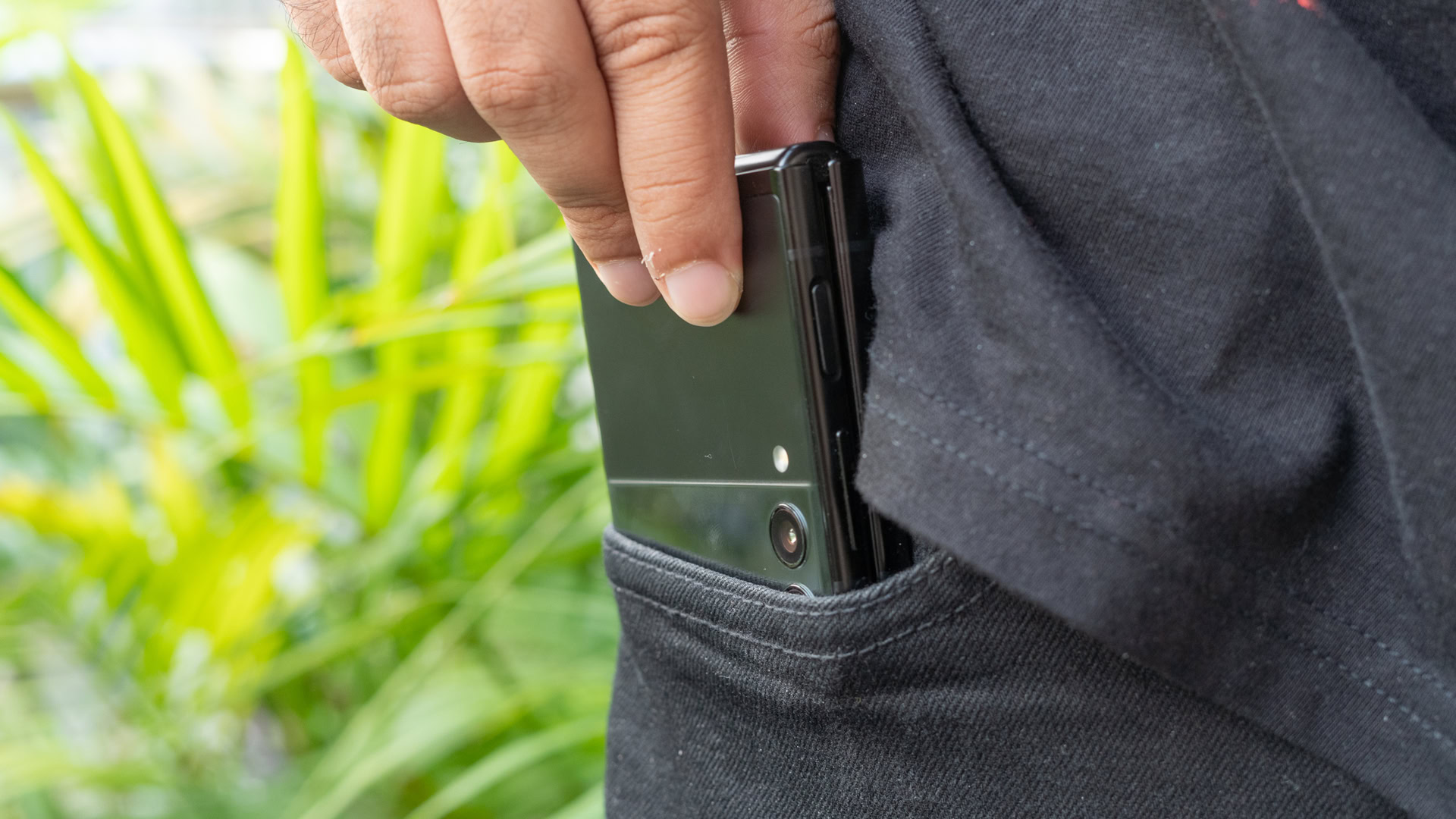 Samsung Galaxy Z Flip 3 slliding phone into pocket