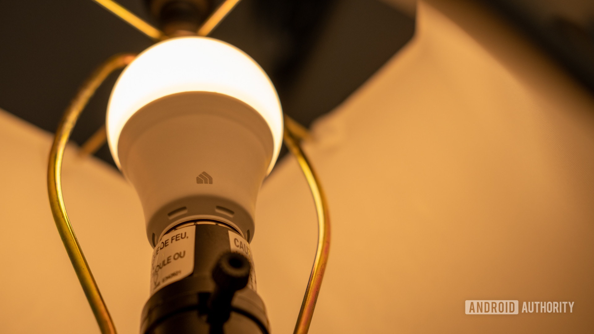 A close up image of the TP-Link Kasa Smart light bulb showing the Kasa Smart logo