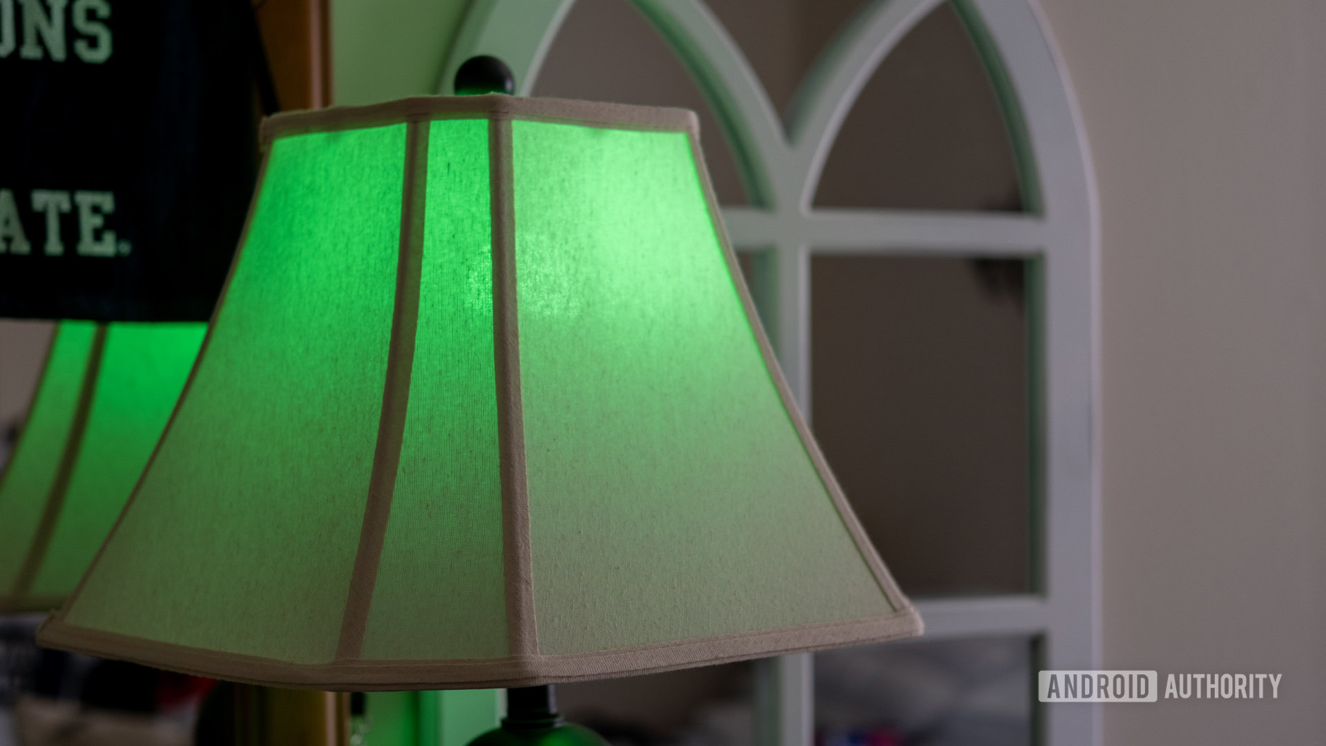 An image of the TP-Link Kasa Smart light bulb set to green