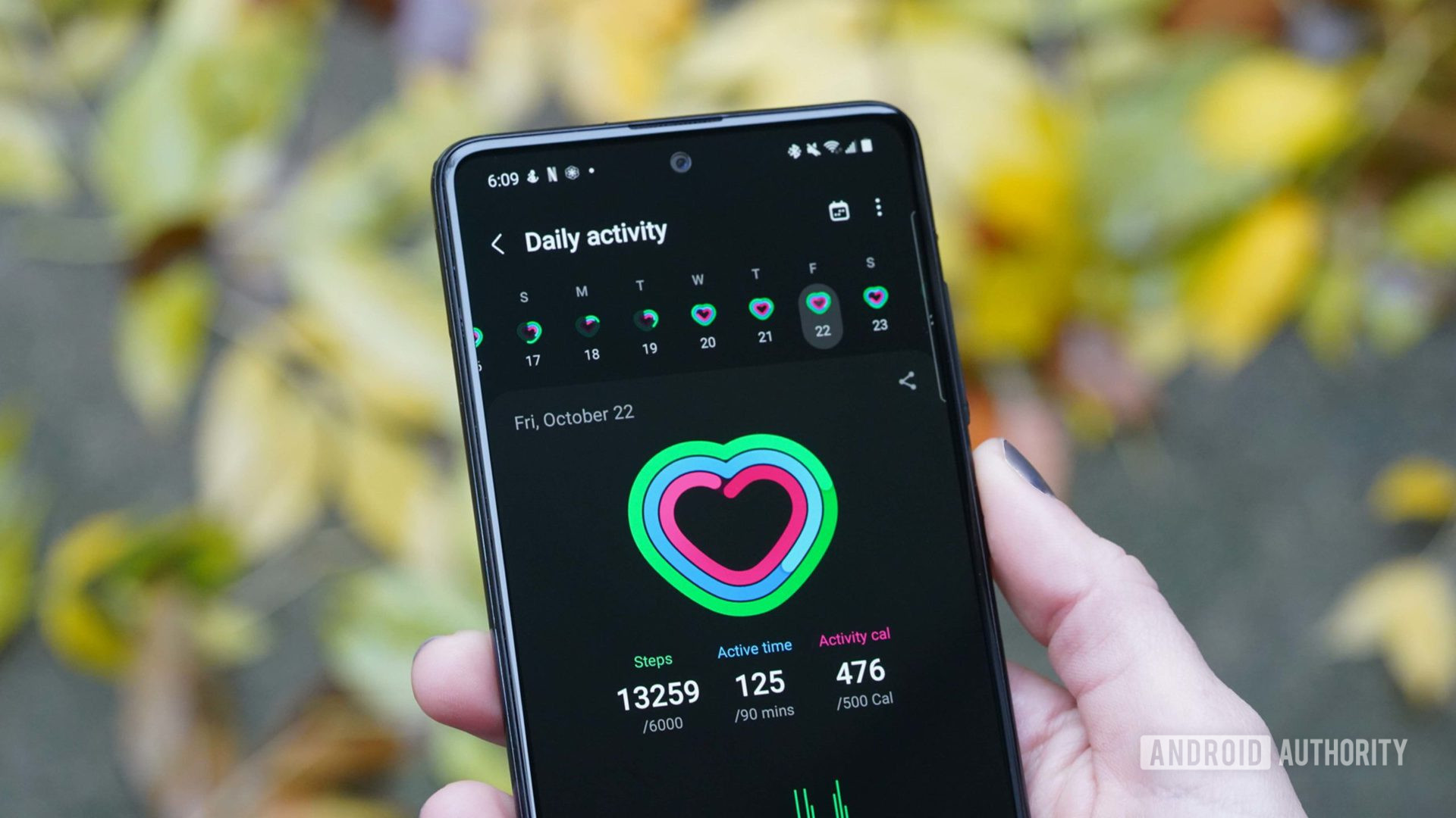 A user reviews their daily activity in the samsung health app.