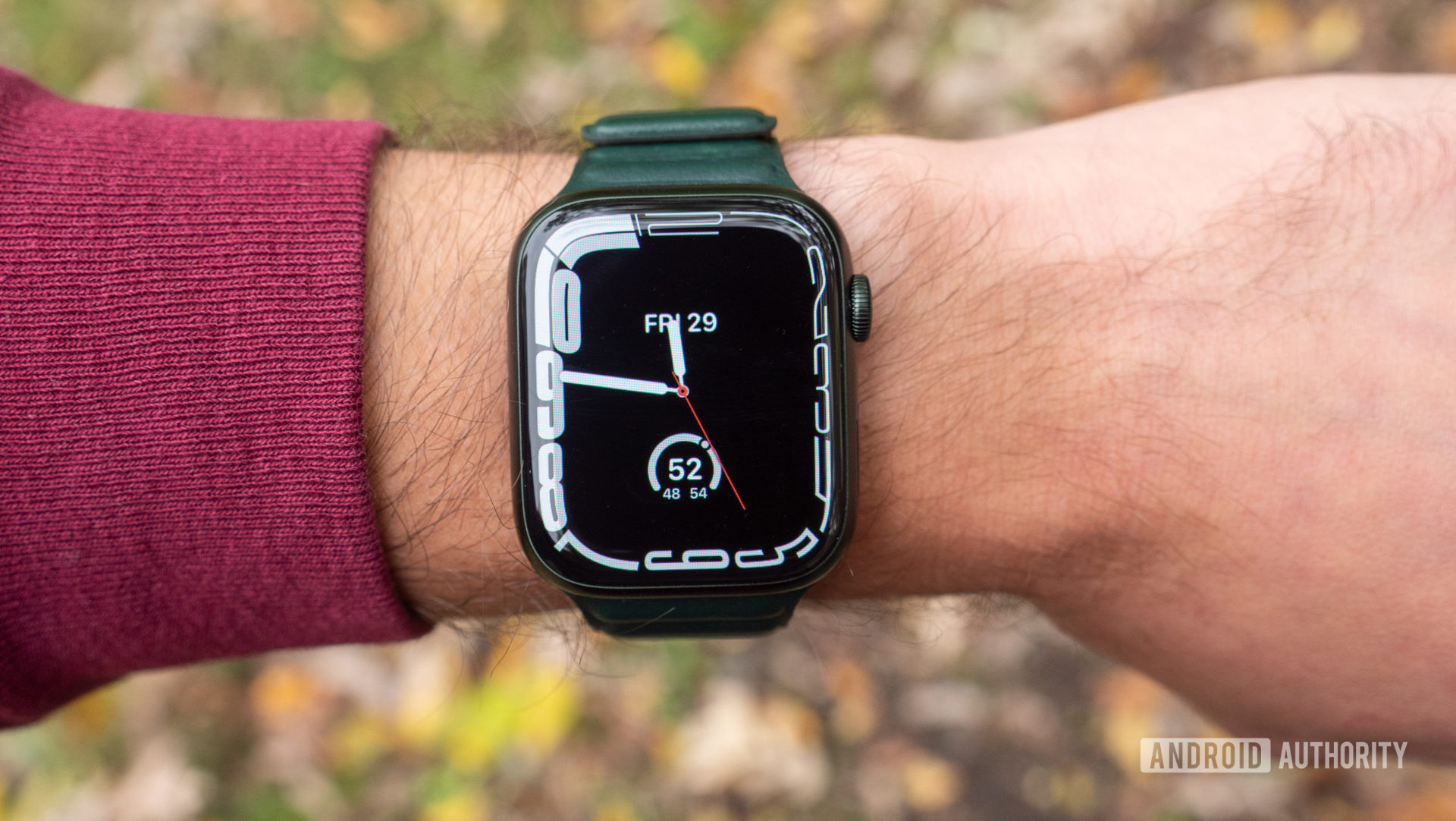 The Apple Watch Series 7 on a wrist showing the Contour watch face