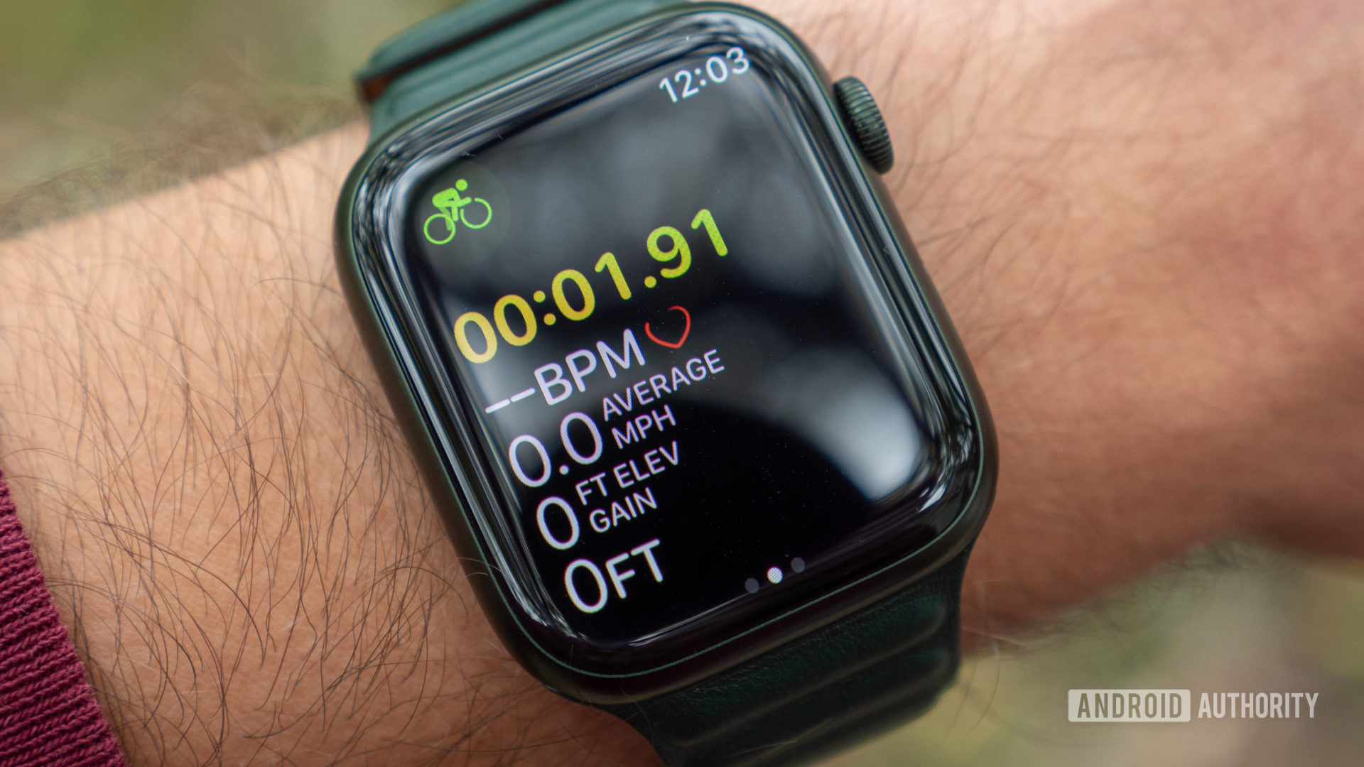 An image of the Apple Watch Series 7 on a wrist showing a cycling workout in progress